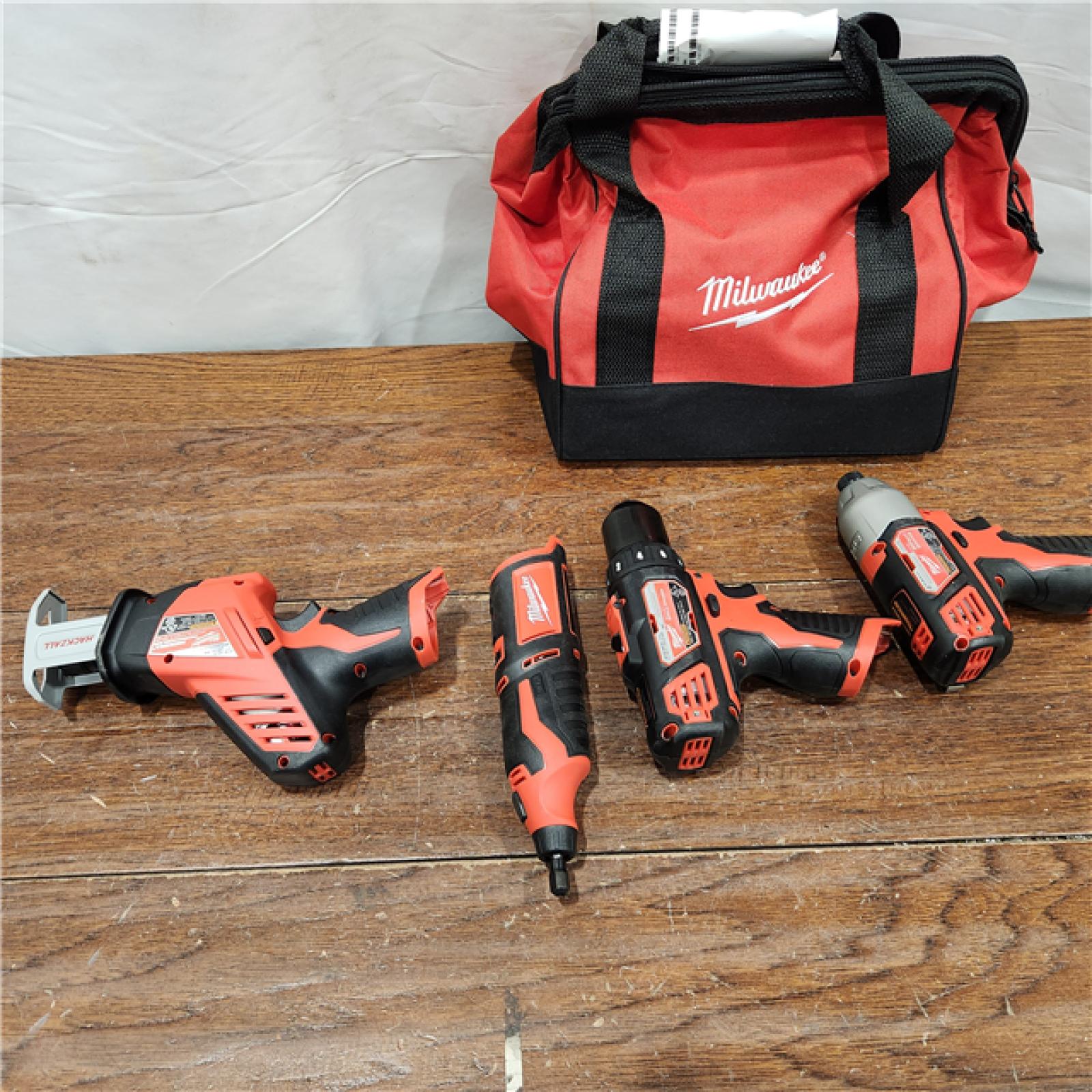 AS-IS M12 12V Lithium-Ion Cordless 4-Tool Combo Kit with (2) Compact 1.5Ah Batteries and Charger