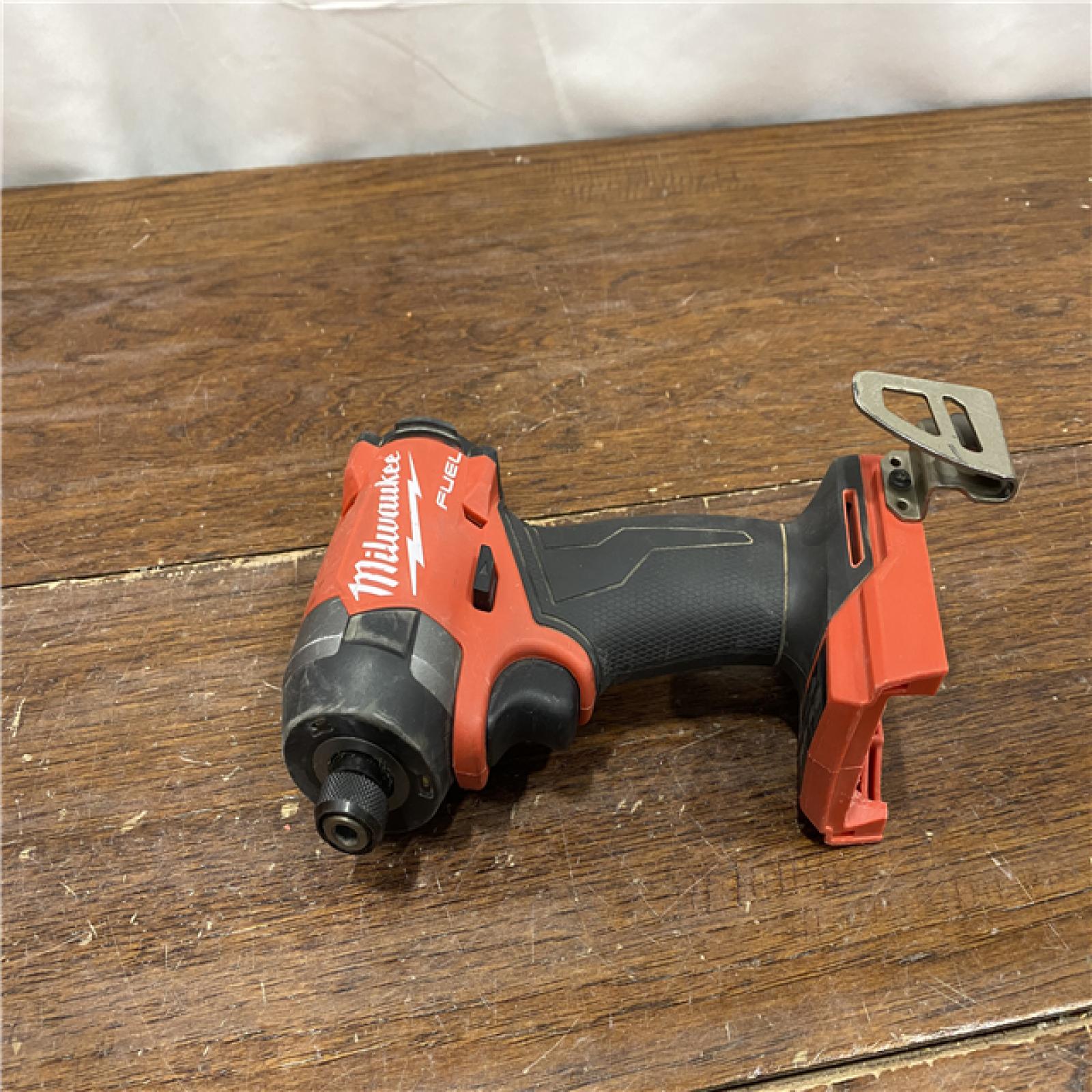 AS-ISMilwaukee 2953-20 18V Lithium-Ion Brushless Cordless 1/4   Hex Impact Driver Bare Tool  Red