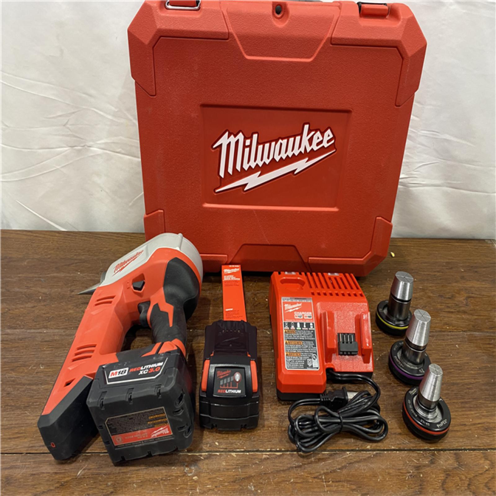 AS-ISMilwaukee M18 FUEL 18V Lithium-Ion Brushless Cordless Hammer Drill and Impact Driver Combo Kit (2-Tool) with 2 Batteries