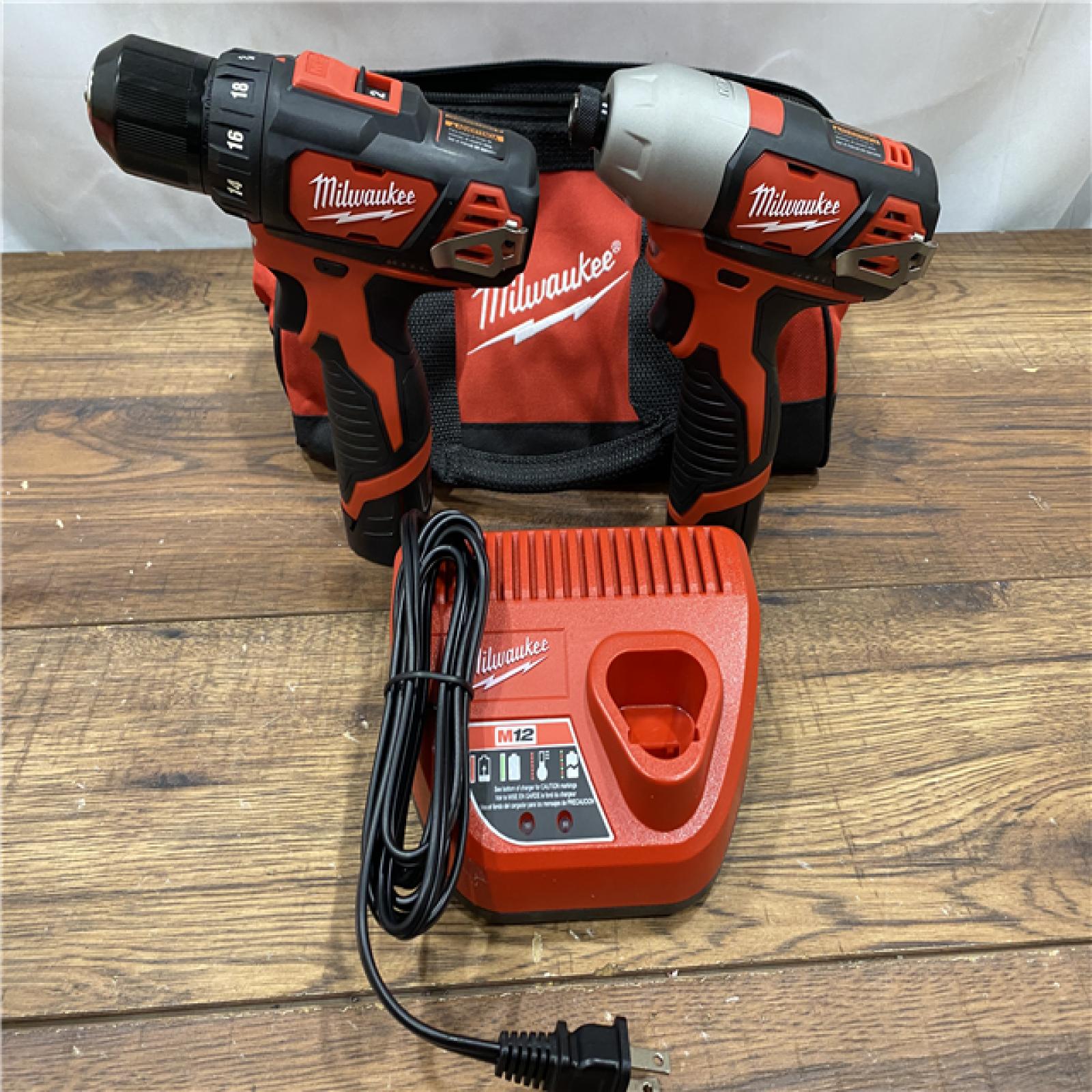 AS IS Milwaukee 2494-22 M12 Cordless Combination 3/8  Drill / Driver and 1/4  Hex Impact Driver Dual Power Tool Kit (2 Lithium Ion Batteries  Charger  and B