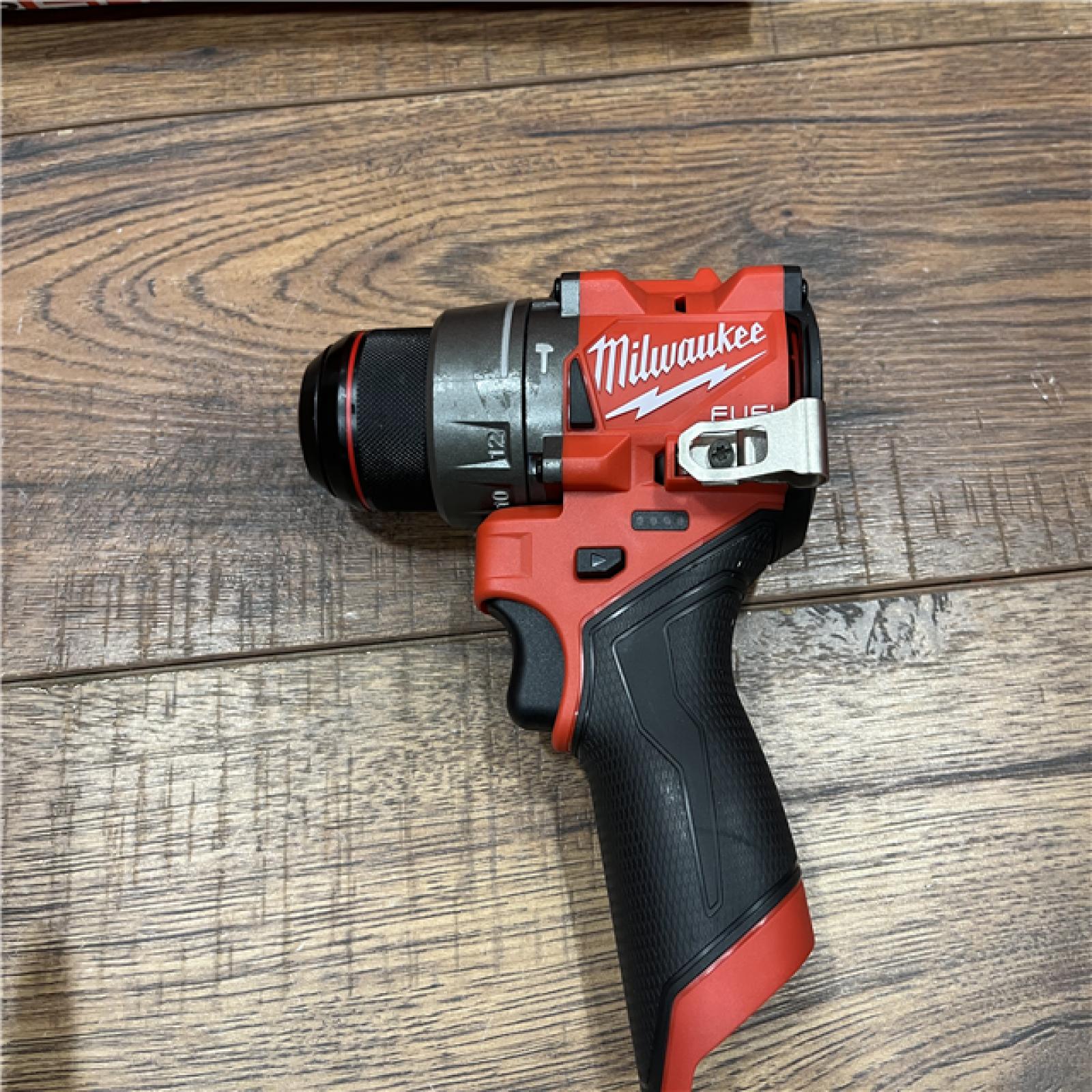 AS-IS Milwaukee M12 FUEL 12-Volt Lithium-Ion Brushless Cordless 1/2 in. Hammer Drill Kit with 1 Compact 2.0Ah Battery Pack and 1 Charger