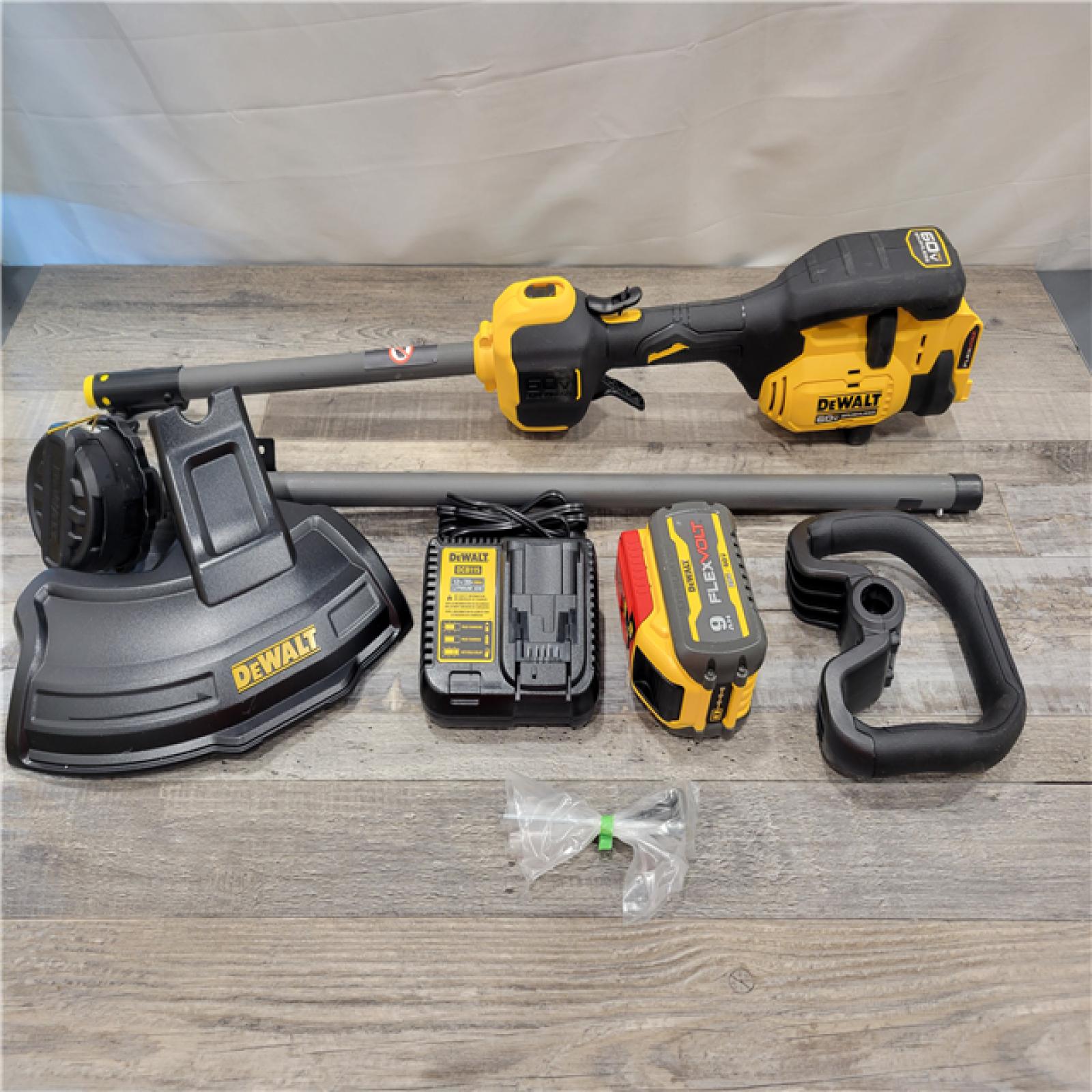 AS-IS DEWALT FLEXVOLT 60V MAX Brushless Cordless Attachment Capable 17 in. Trimmer Kit