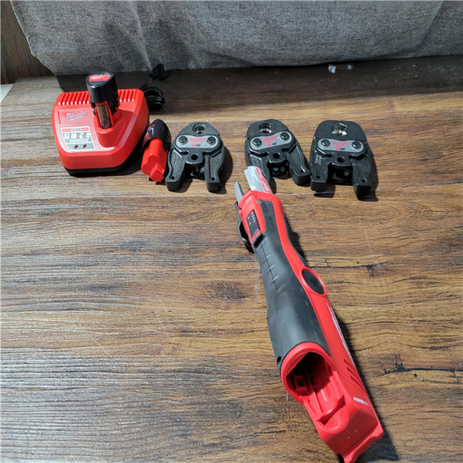 CALIFORNIA AS-IS MILWAUKEE M12 FORCE LOGIC PRESS TOOL 1/2-1 KIT (BATTERIES AND CHARGER INCLUDED)