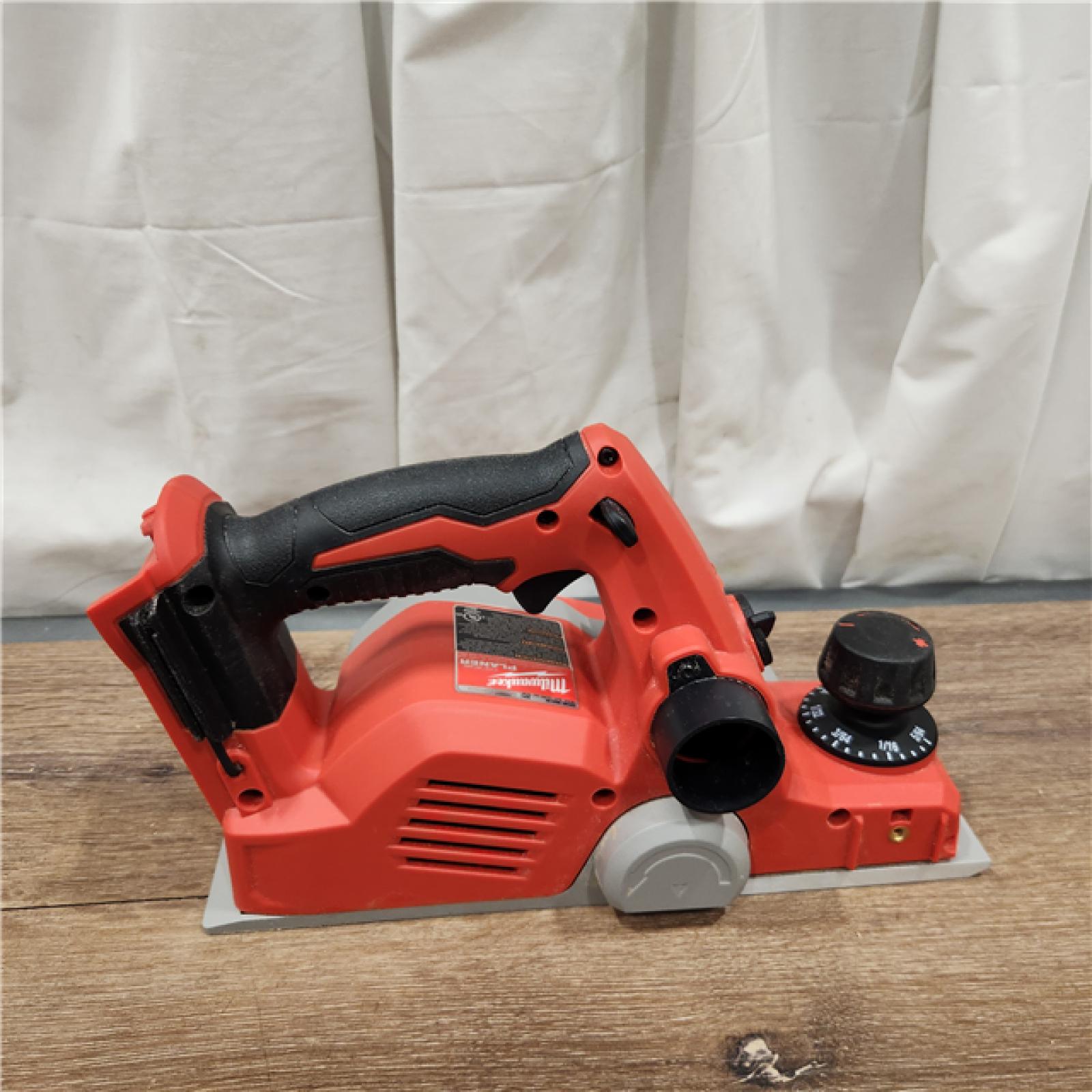 AS-IS Milwaukee M18 18-Volt Lithium-Ion Cordless 3-1/4 in. Planer (Tool-Only)