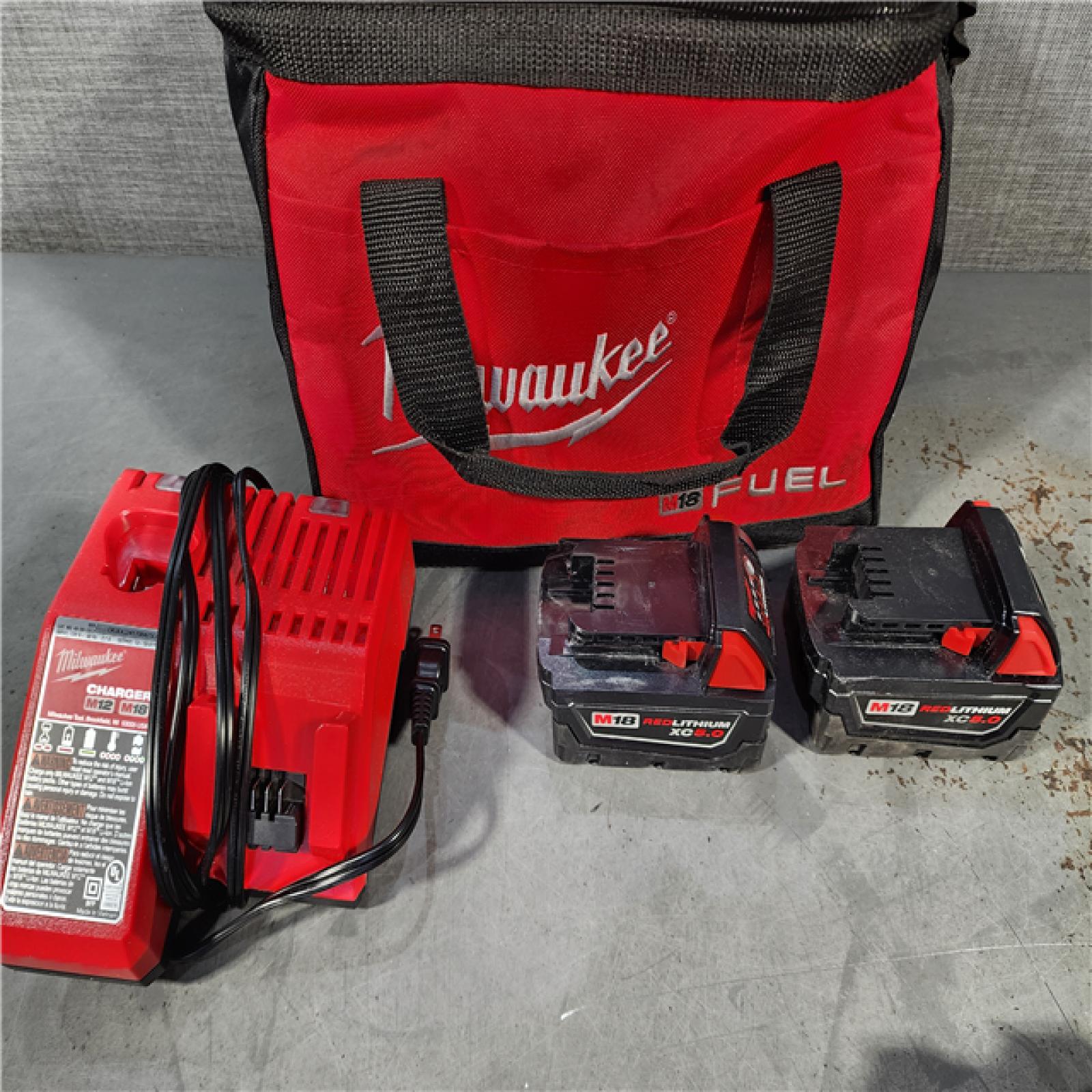 HOUSTON LOCATION - AS-IS Milwaukee M18 FUEL GEN-2 18V Lithium-Ion Mid Torque Brushless Cordless 3/8 in. Impact Wrench with Friction Ring Kit W/ (2) BATTERY, CHARGER, AND TOOL BAG