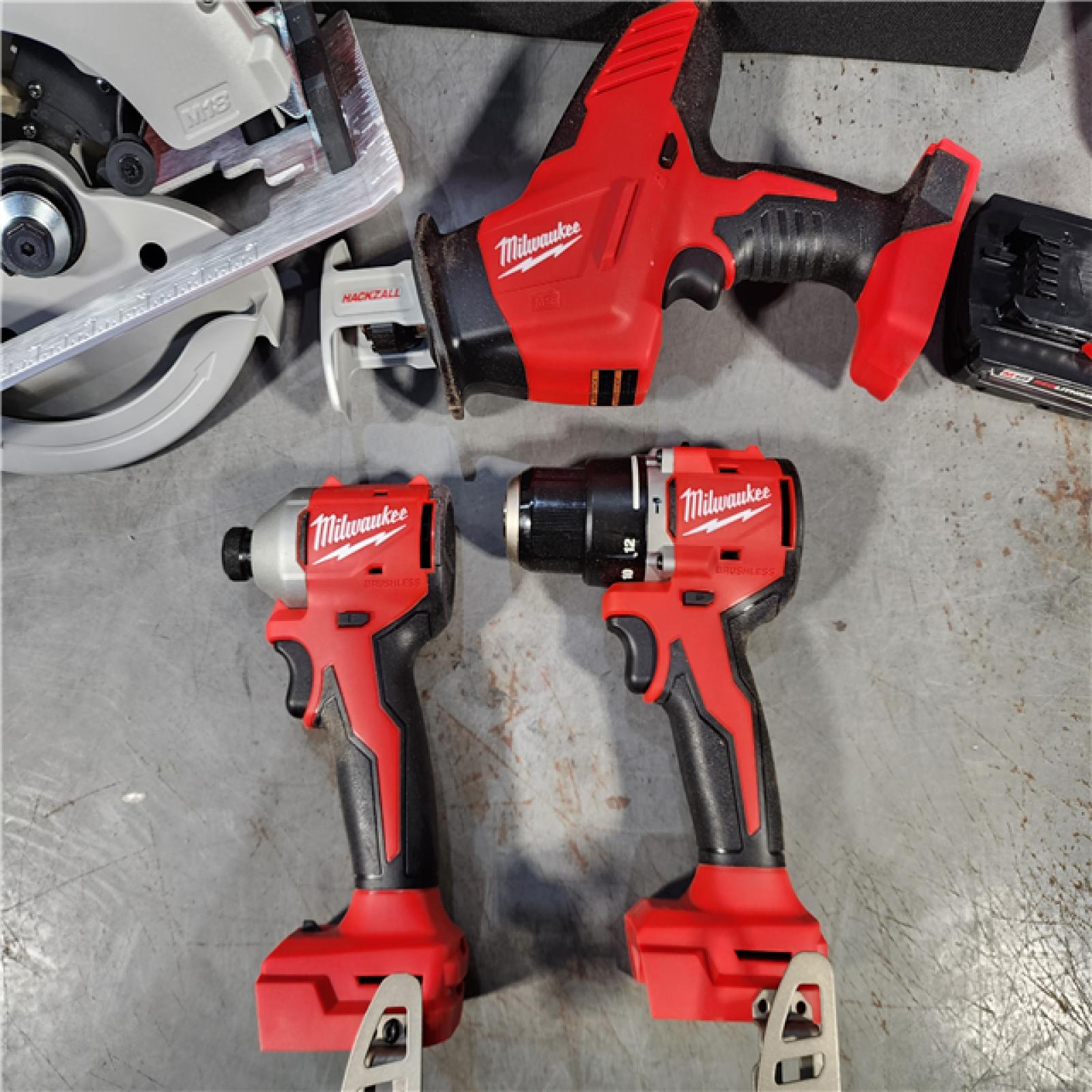 HOUSTON LOCATION - AS-IS Milwaukee M18 18-Volt Lithium-Ion Brushless Cordless Combo Kit (4-Tool) with 2-Batteries, 1-Charger and Tool Bag