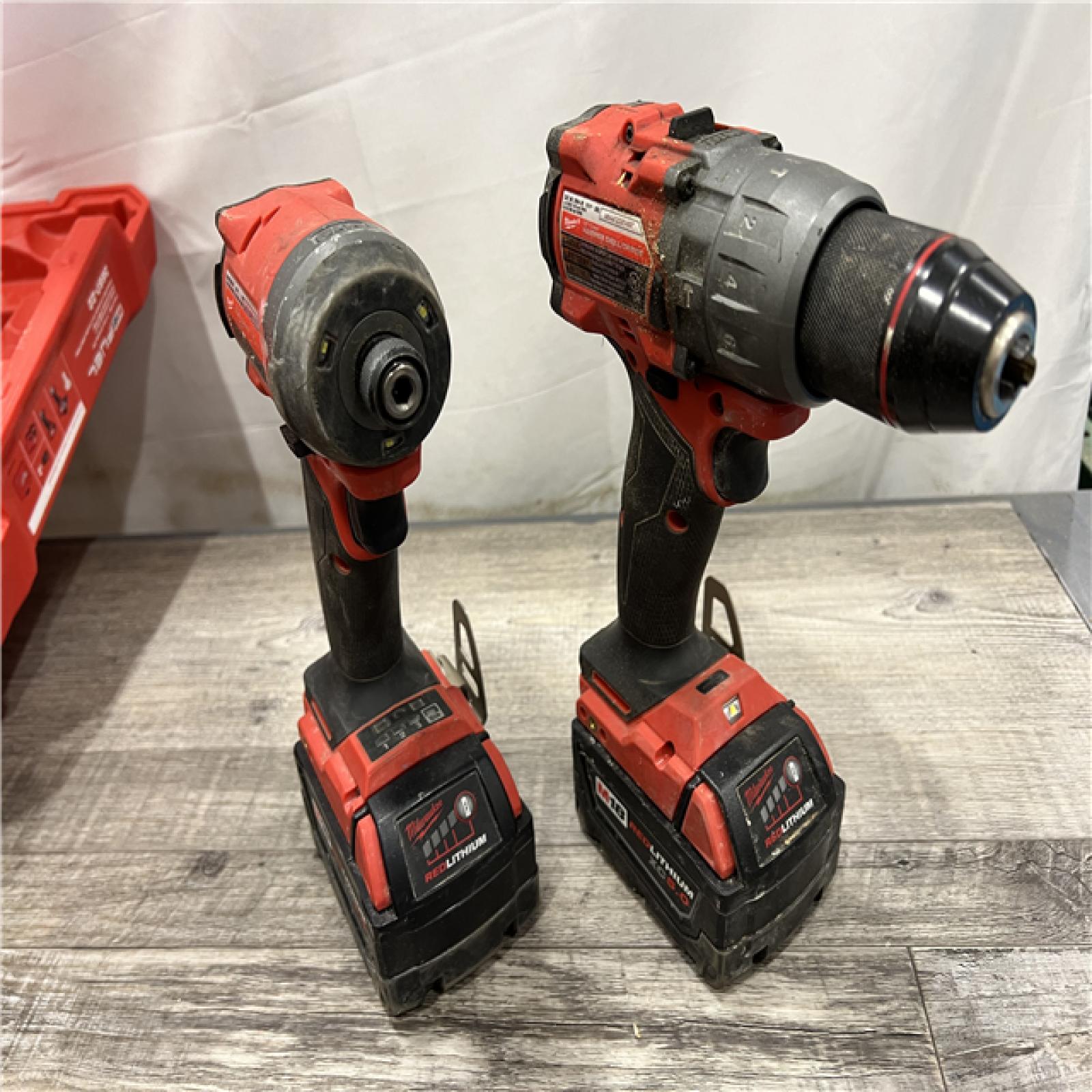 AS-IS Milwaukee M18 FUEL 18V Lithium-Ion Brushless Cordless Hammer Drill and Impact Driver Combo Kit (2-Tool) with 2 Batteries