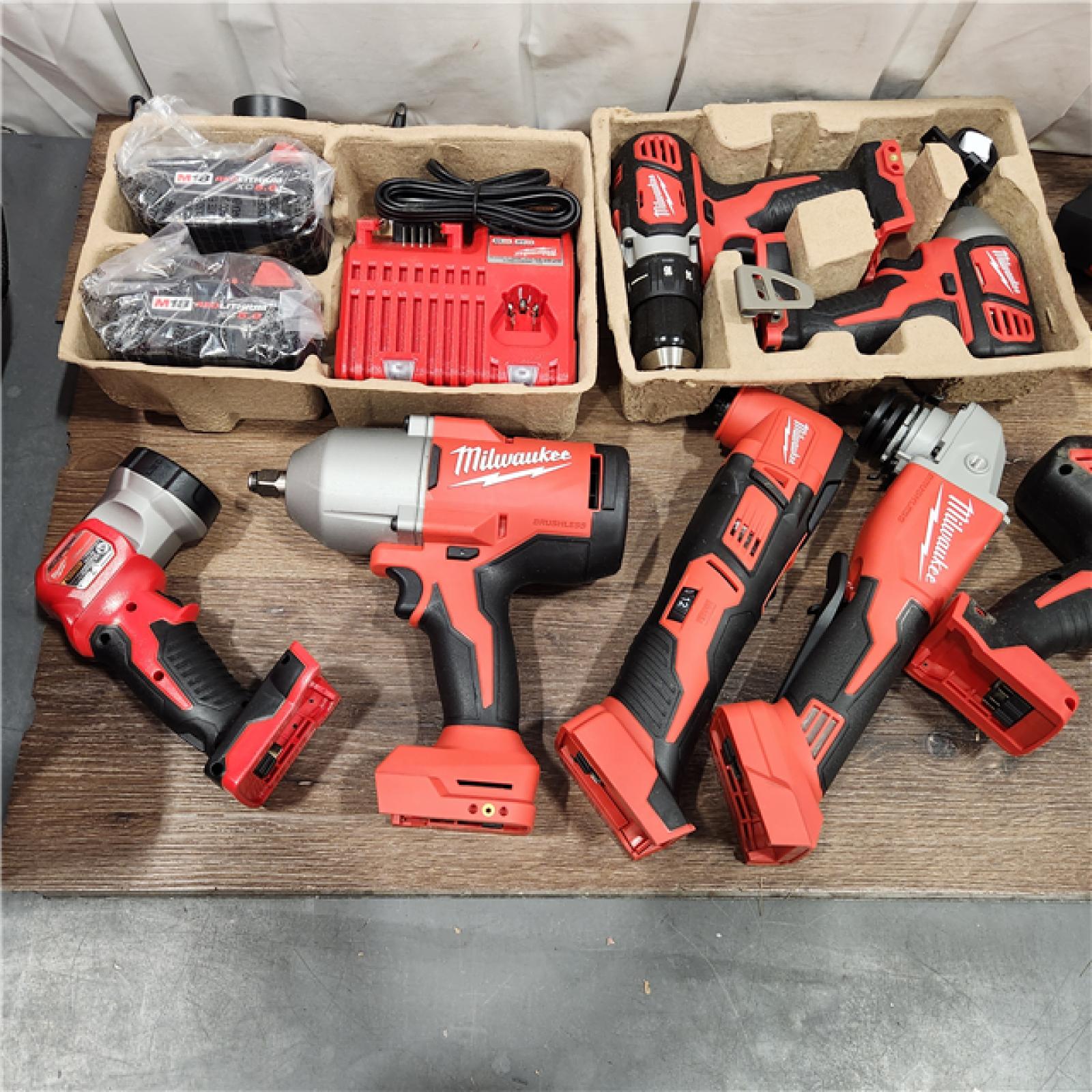 AS-IS MILWAUKEE  M18 18-Volt Lithium-Ion Cordless Combo Kit (9-Tool) with (2) Batteries, Charger, and Tool Bag