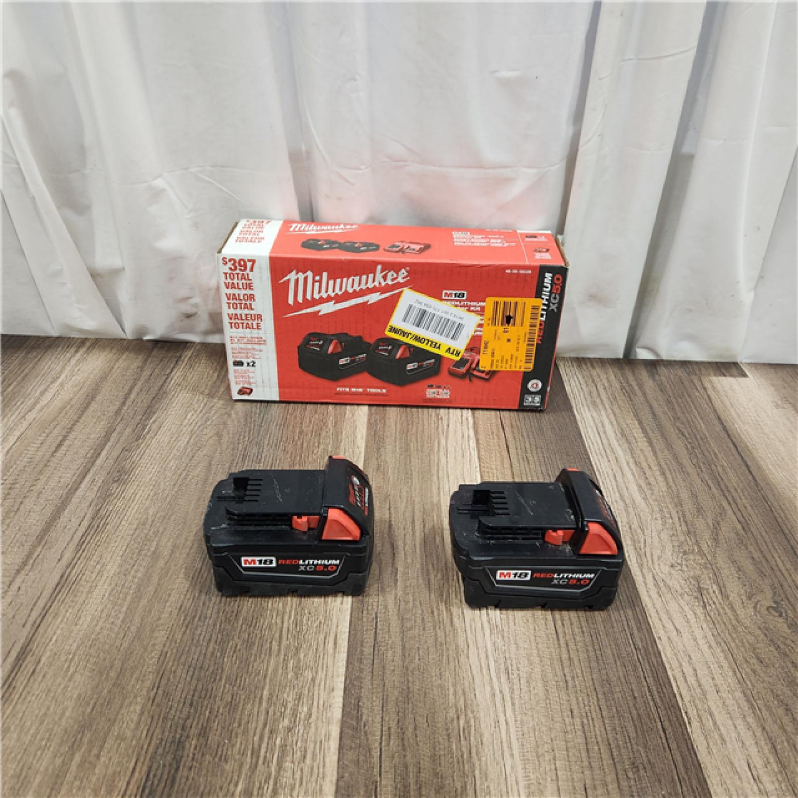 AS IS M18 18-Volt Lithium-Ion XC Starter Kit with Two 5.0Ah Batteries and Charger