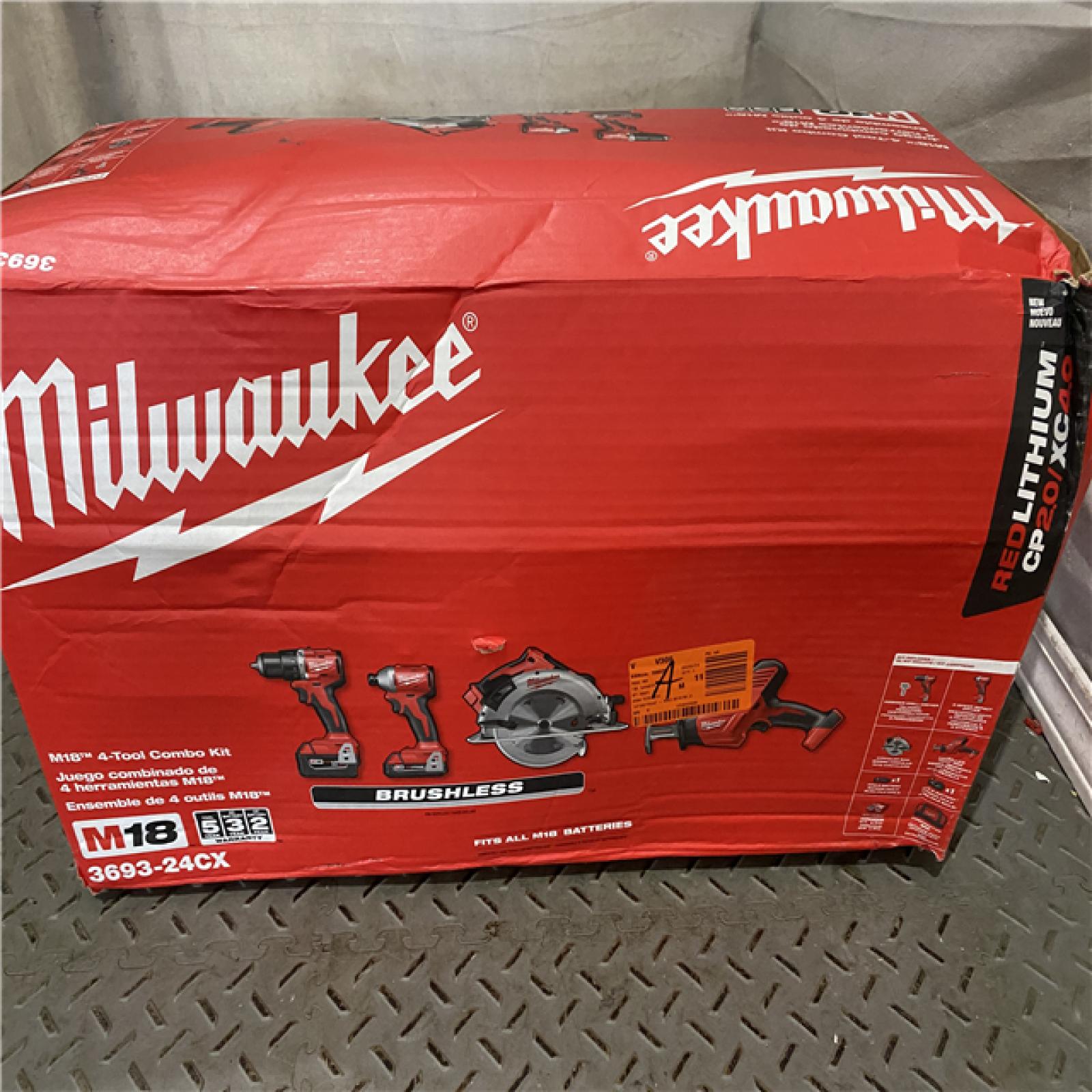 Houston location AS-IS MILWUKEE M18 18-Volt Lithium-Ion Brushless Cordless Combo Kit (4-Tool) with 2-Batteries, 1-Charger and Tool Bag