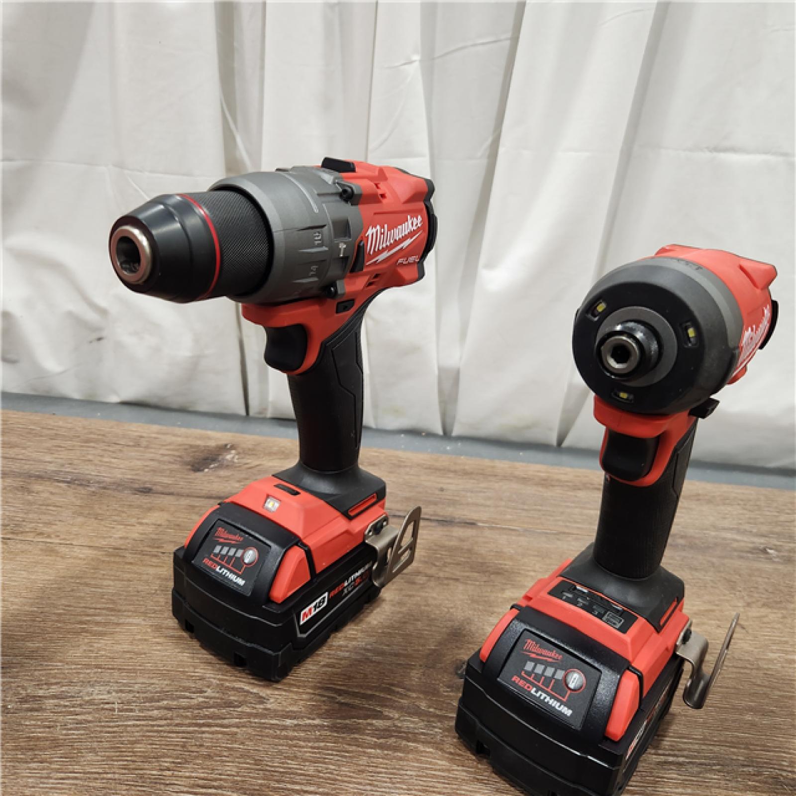 AS-IS Milwaukee M18 FUEL 18V Lithium-Ion Brushless Cordless Hammer Drill and Impact Driver Combo Kit (2-Tool) with 2 Batteries