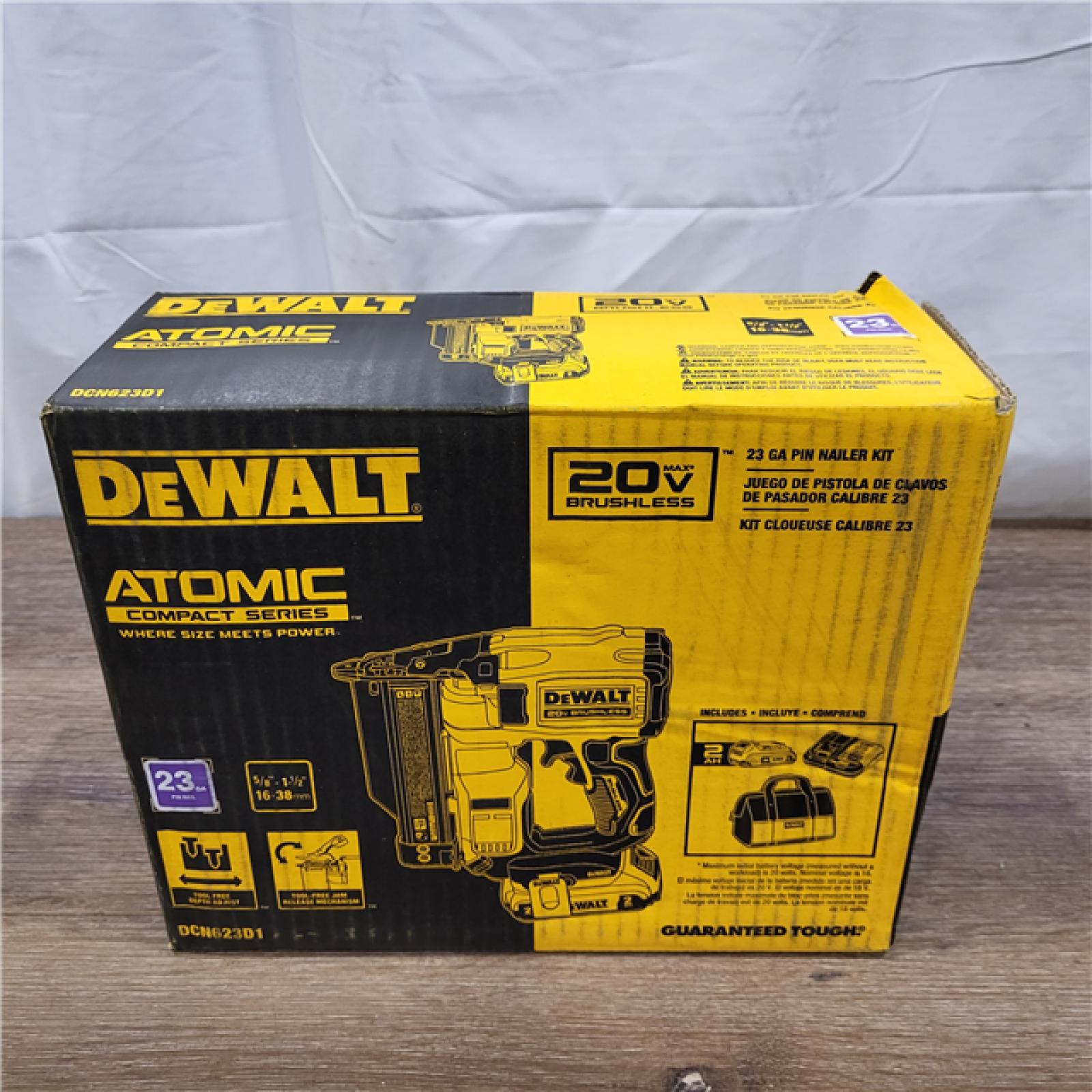 AS-IS DEWALT ATOMIC 20V MAX Lithium Ion Cordless 23 Gauge Pin Nailer Kit with 2.0Ah Battery and Charger