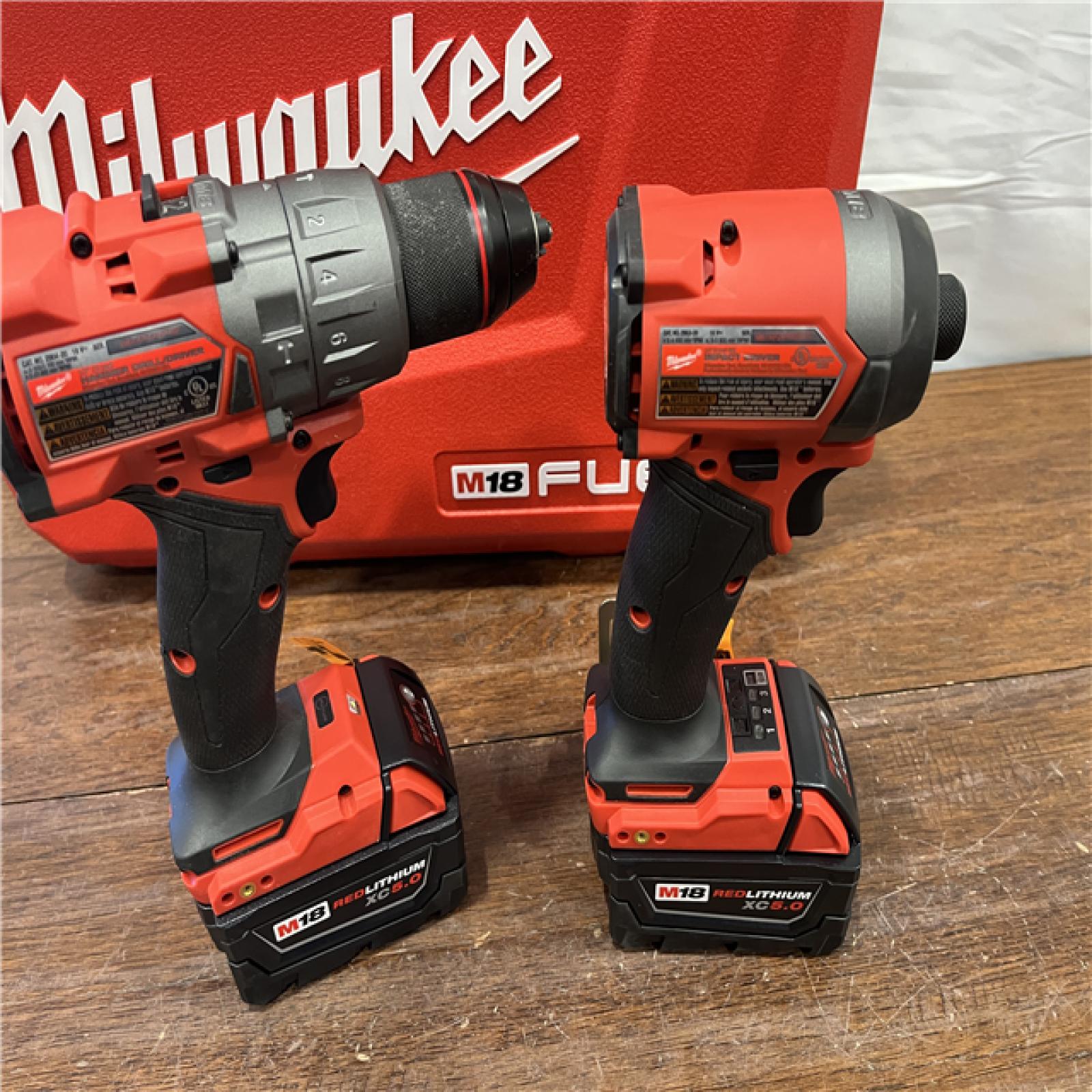 AS-ISMilwaukee M18 FUEL 18V Lithium-Ion Brushless Cordless Hammer Drill and Impact Driver Combo Kit (2-Tool) with 2 Batteries