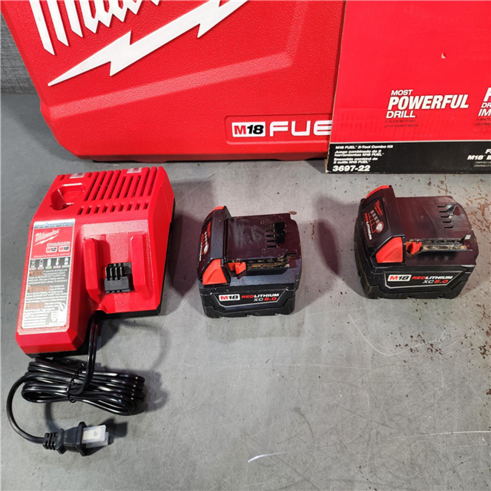 HOUSTON LOCATION - AS-IS Milwaukee M18 FUEL 18V Lithium-Ion Brushless Cordless Hammer Drill and Impact Driver Combo Kit (2-Tool) with 2 Batteries