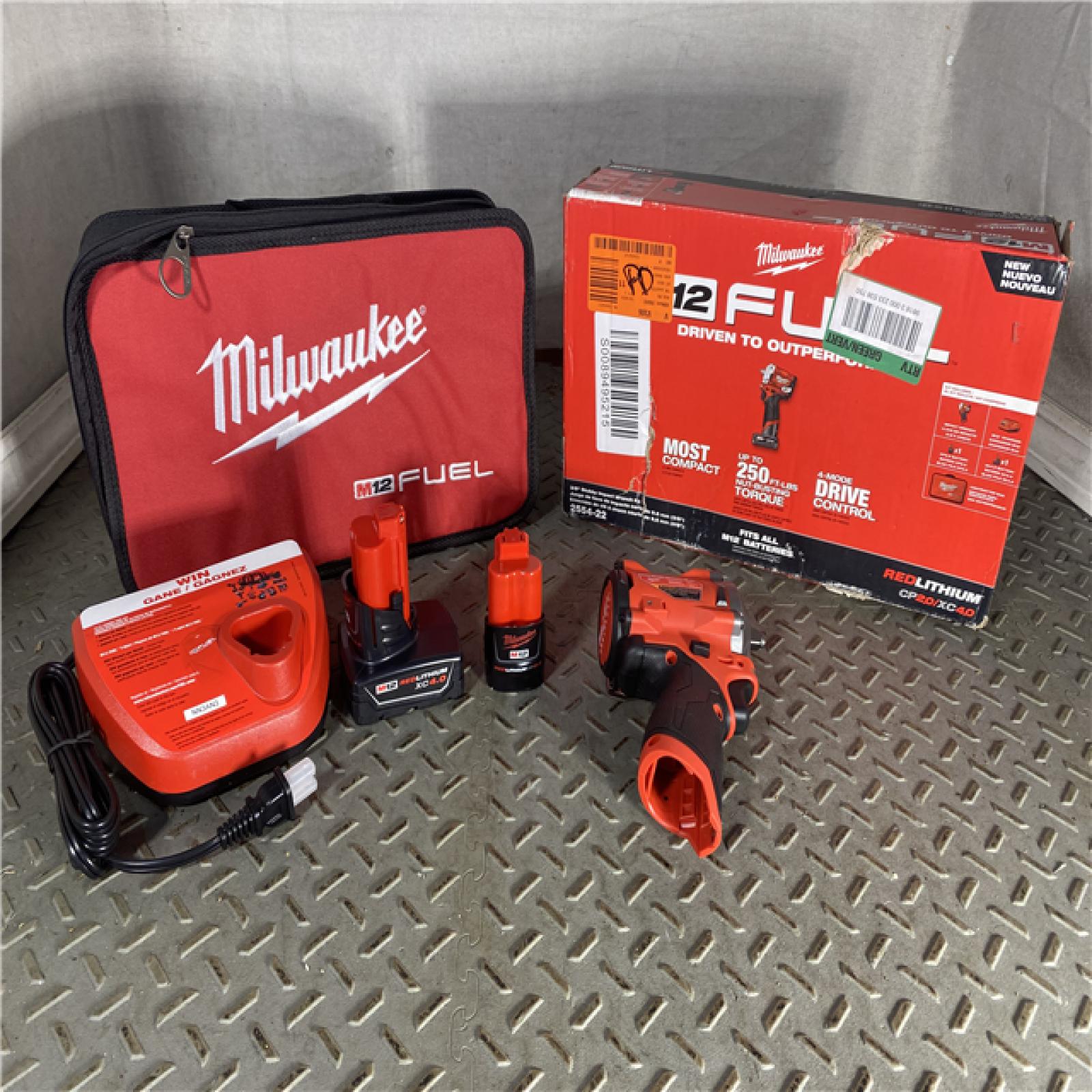 HOUSTON LOCATION - AS-IS Milwaukee 2554-22 M12 FUEL Stubby 3/8 in. Impact Wrench Kit (2 Ah/4 Ah)