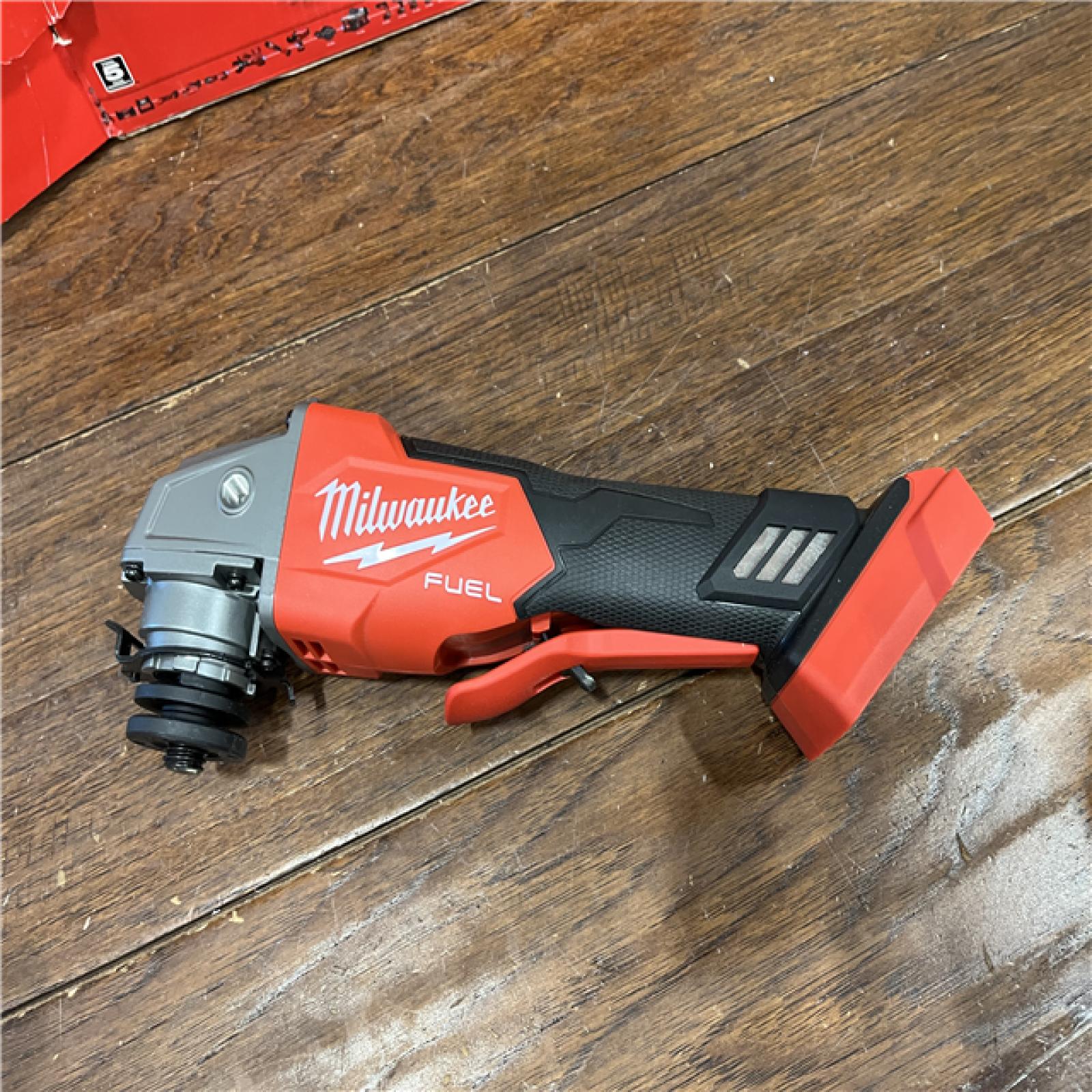 AS-ISMilwaukee 2880-20 M18 FUEL 18-Volt Lithium-Ion Brushless Cordless 4-1/2 in./5 in. Grinder W/Paddle Switch (Tool-Only)