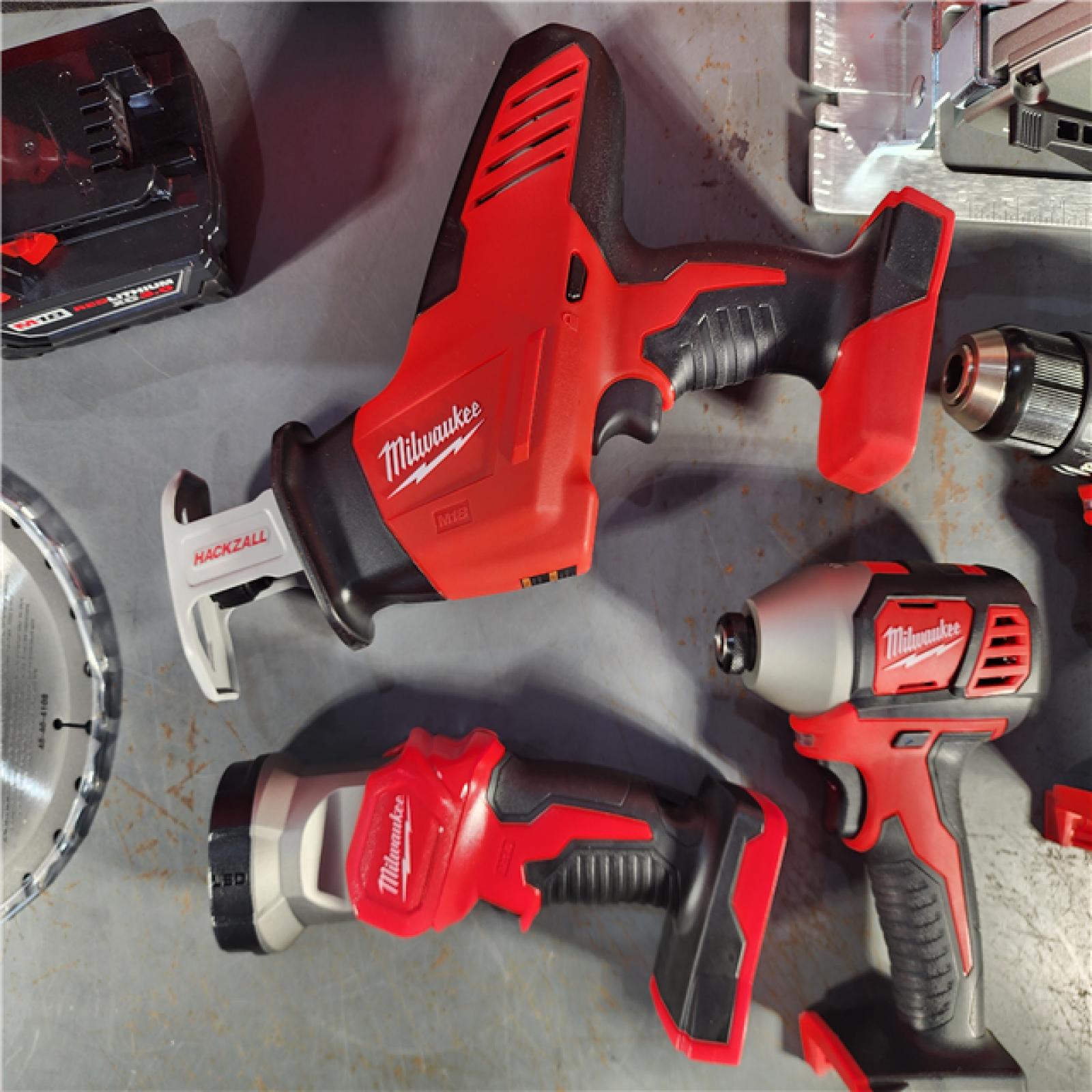 HOUSTON LOCATION - AS-IS (APPEARS LIKE NEW) Milwaukee M18 18-Volt Lithium-Ion Cordless Combo Tool Kit (5-Tool) with (1) 3.0Ah and (1) 1.5Ah Battery, (1) Charger, (1) Tool Bag