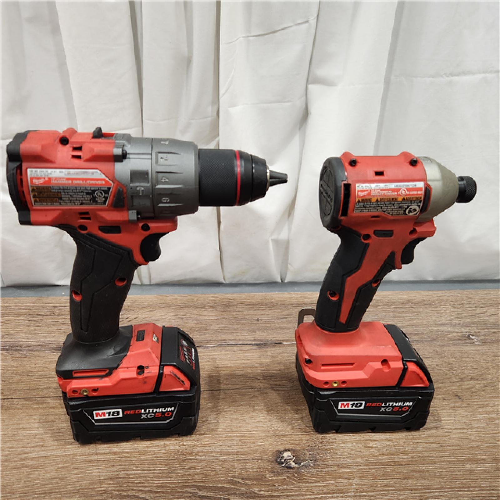 AS-IS Milwaukee M18 FUEL 18V Lithium-Ion Brushless Cordless Hammer Drill and Impact Driver Combo Kit (2-Tool) with 2 Batteries