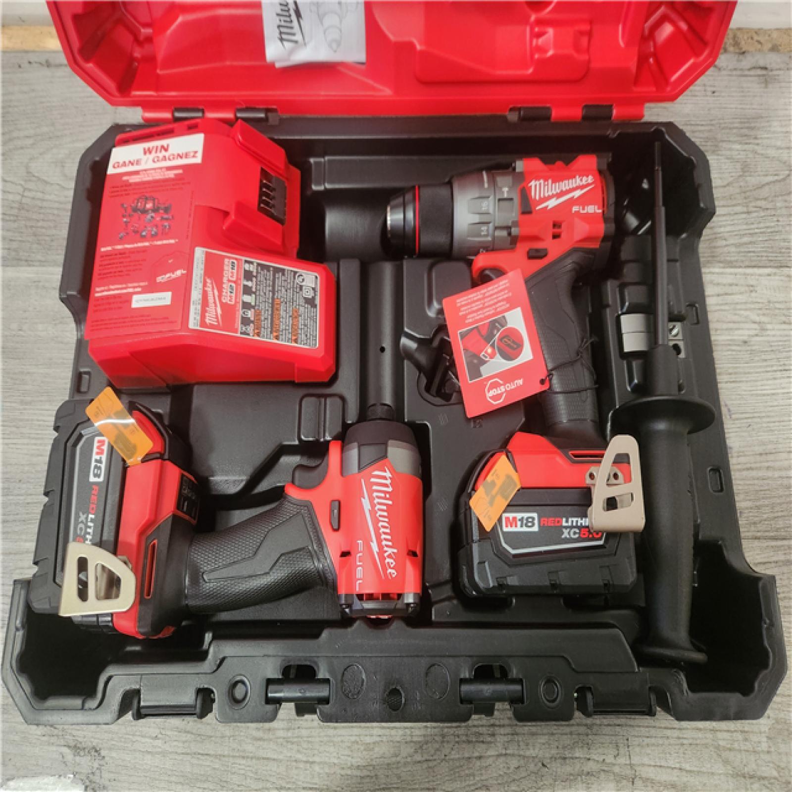 Phoenix Location NEW Milwaukee M18 FUEL 18V Lithium-Ion Brushless Cordless Hammer Drill and Impact Driver Combo Kit (2-Tool) with 2 Batteries