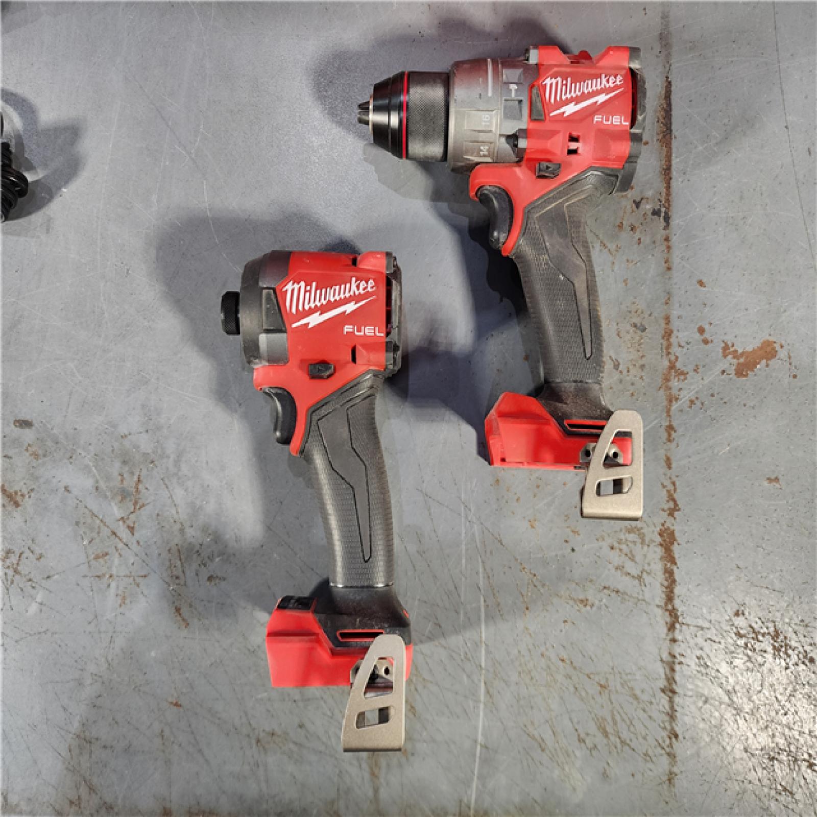 HOUSTON LOCATION - AS-IS Milwaukee M18 FUEL 18V Lithium-Ion Brushless Cordless Hammer Drill and Impact Driver Combo Kit (2-Tool) with 2 Batteries