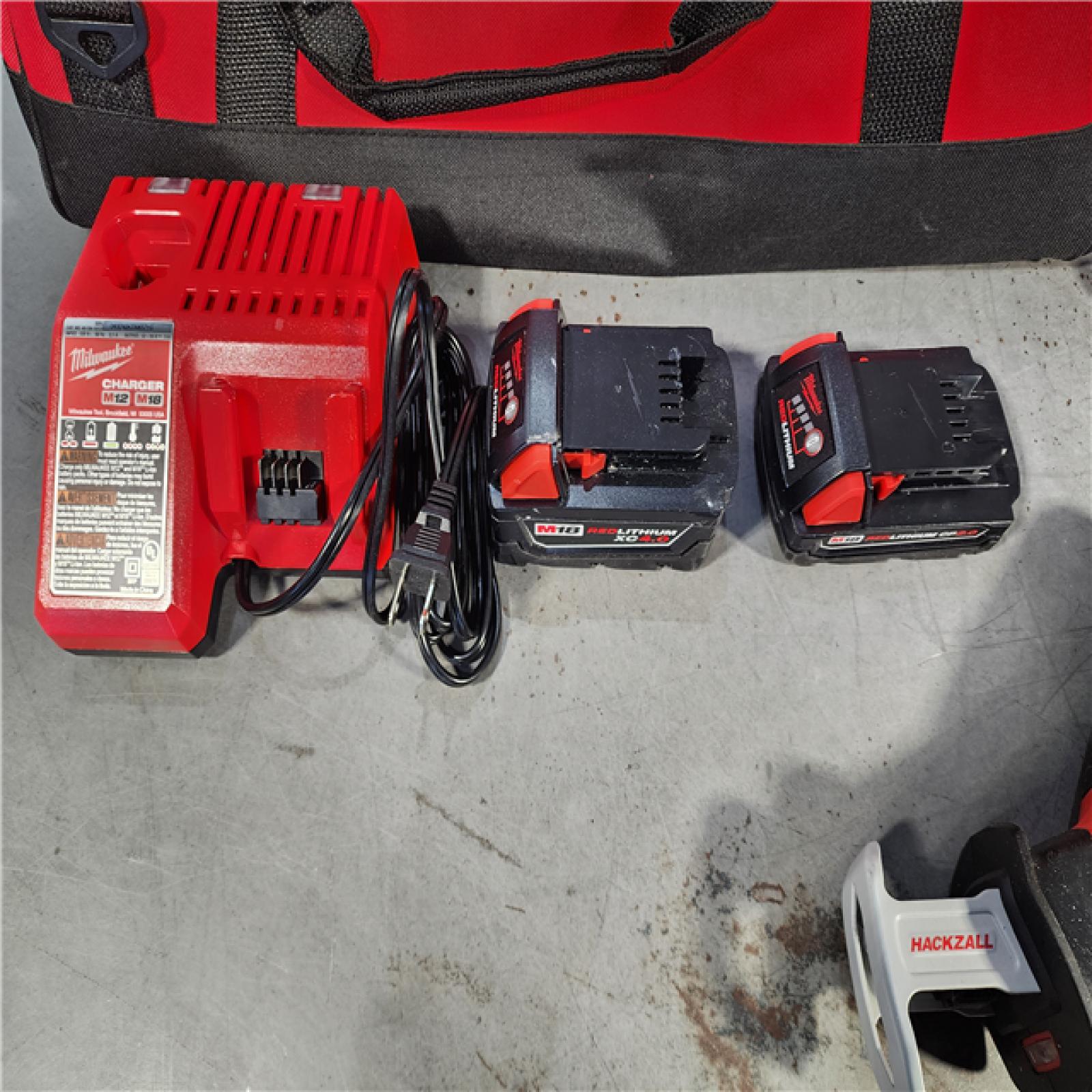 HOUSTON LOCATION - AS-IS (APPEARS LIKE NEW) Milwaukee M18 18-Volt Lithium-Ion Brushless Cordless Combo Kit (4-Tool) with 2-Batteries, 1-Charger and Tool Bag