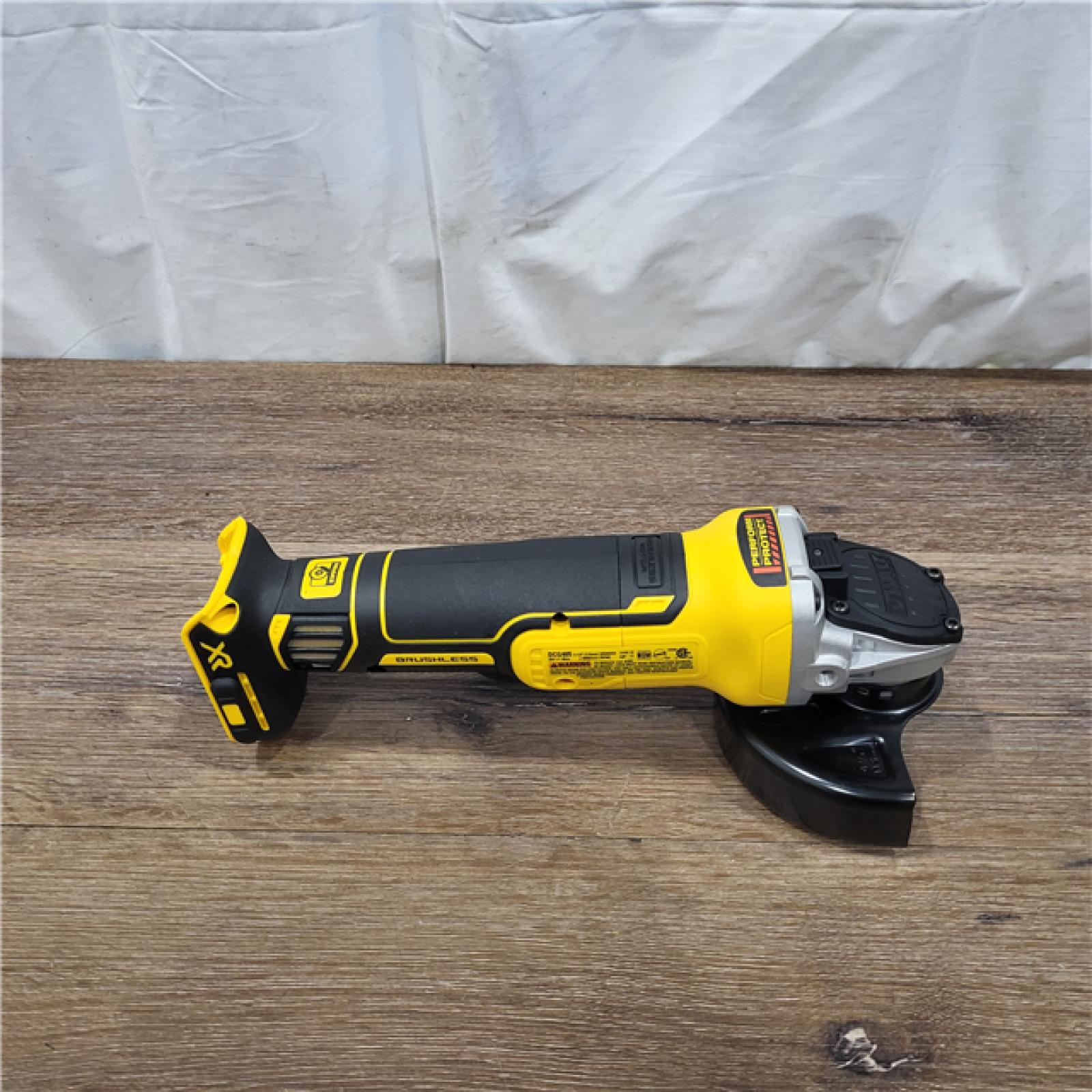 AS-IS DeWalt 20V MAX XR Cordless Brushless 4.5 in. Slide Switch Small Angle Grinder with Kickback Brake (Tool Only)