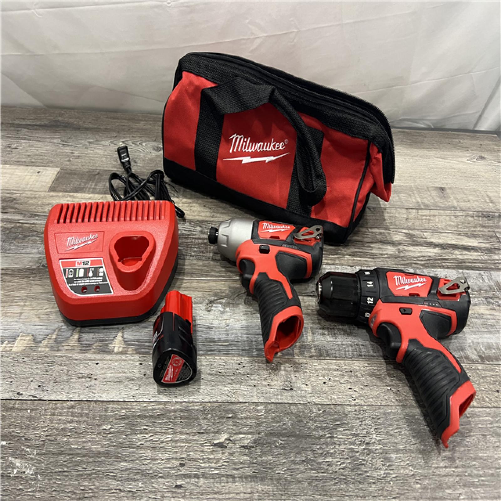 AS-IS MILWAUKEE M12 12V Lithium-Ion Cordless Drill Driver/Impact Driver Combo Kit with Two 1.5Ah Batter Charger and Bag (2-Tool) MISSING ONE BATTERY