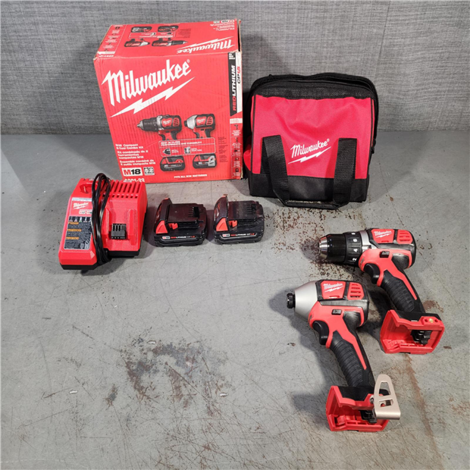 HOUSTON LOCATION - AS-IS Milwaukee M18 18V Cordless Brushed 2 Tool Drill/Driver and Impact Driver Kit