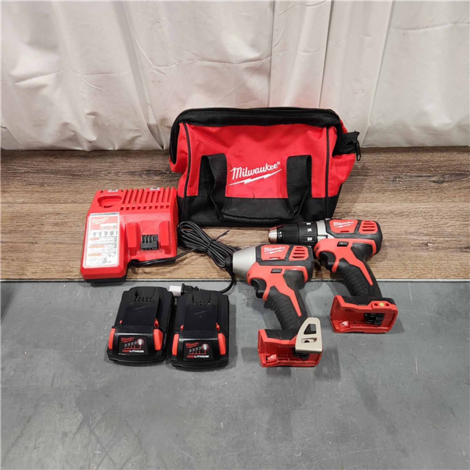 AS IS Milwaukee M18 18V Cordless Brushed 2 Tool Drill/Driver and Impact Driver Kit