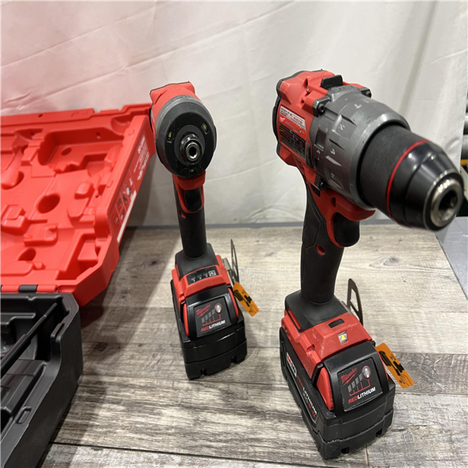 AS-IS Milwaukee M18 FUEL 18V Lithium-Ion Brushless Cordless Hammer Drill and Impact Driver Combo Kit (2-Tool) with 2 Batteries