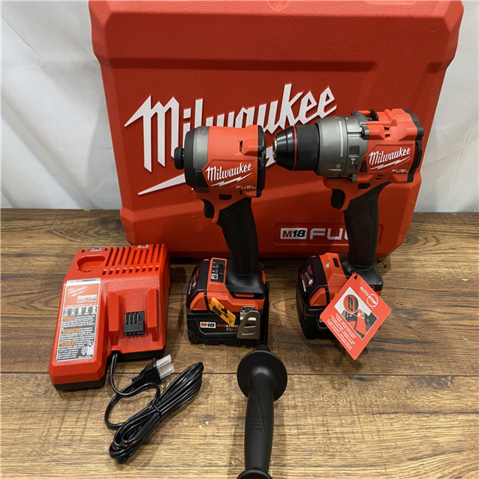 AS IS Milwaukee M18 FUEL 18V Lithium-Ion Brushless Cordless Hammer Drill and Impact Driver Combo Kit (2-Tool) with 2 Batteries