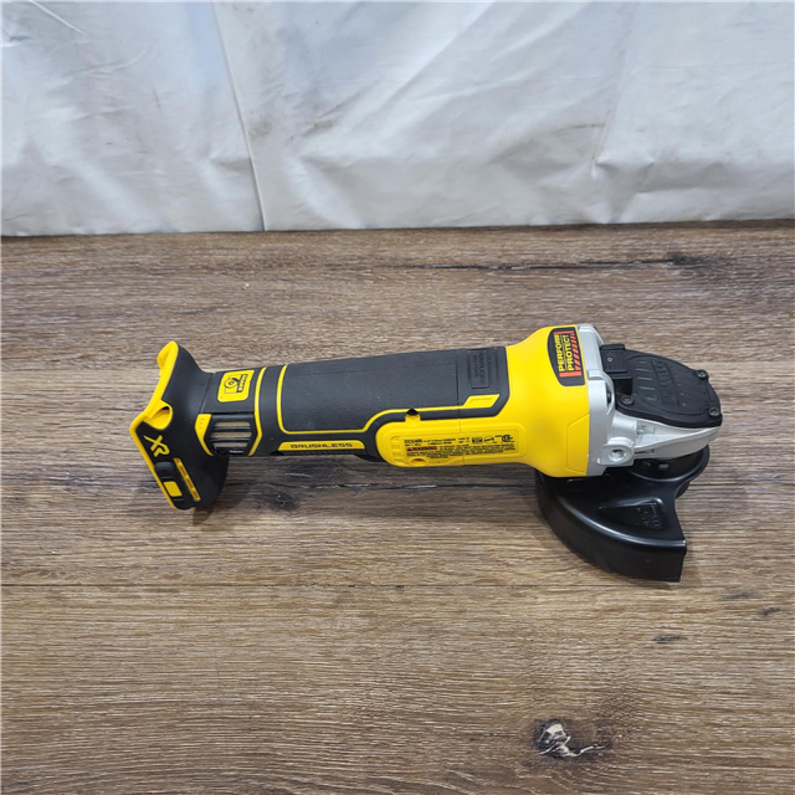 AS-IS DeWalt DCG405B 20V Max XR 4.5-Inch Slide Switch Small Angle Grinder (Tool Only)