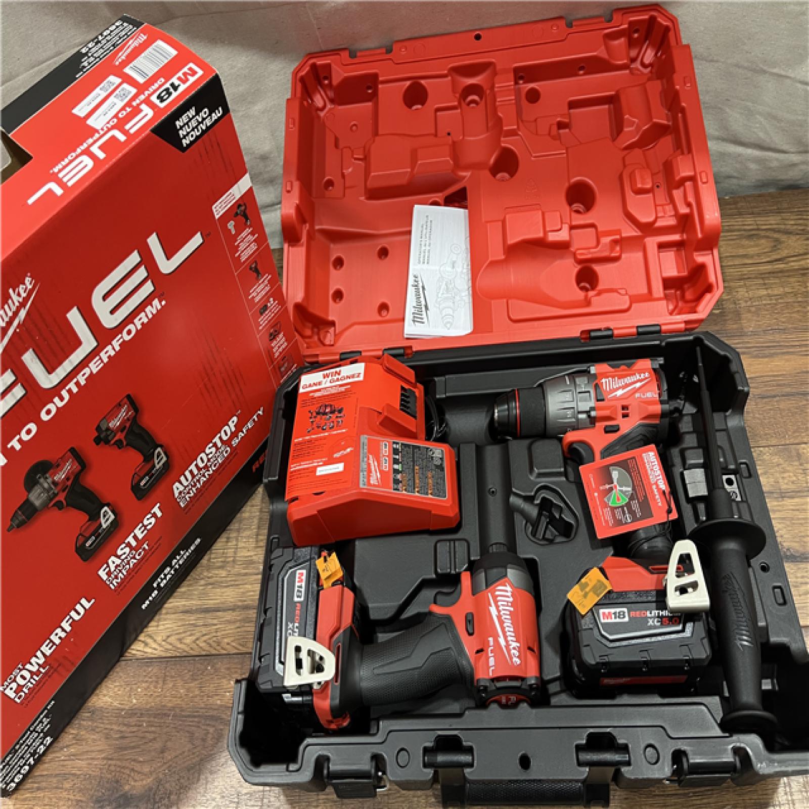 AS-IS Milwaukee M18 FUEL 18V Lithium-Ion Brushless Cordless Hammer Drill and Impact Driver Combo Kit (2-Tool) with 2 Batteries