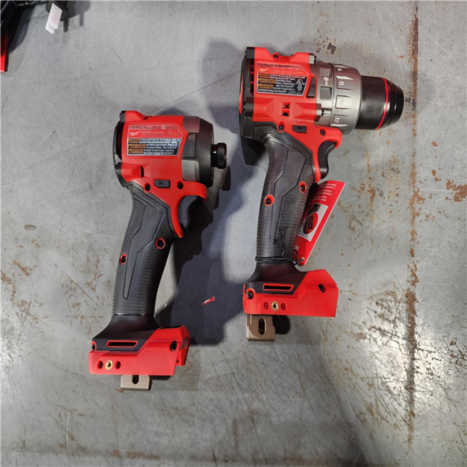 HOUSTON LOCATION - AS-IS (APPEARS LIKE NEW) Milwaukee 2697-22 M18 18-Volt 1/2-Inch 2-Tool Combo Kit Includes Charger, Battery (2) and Bag