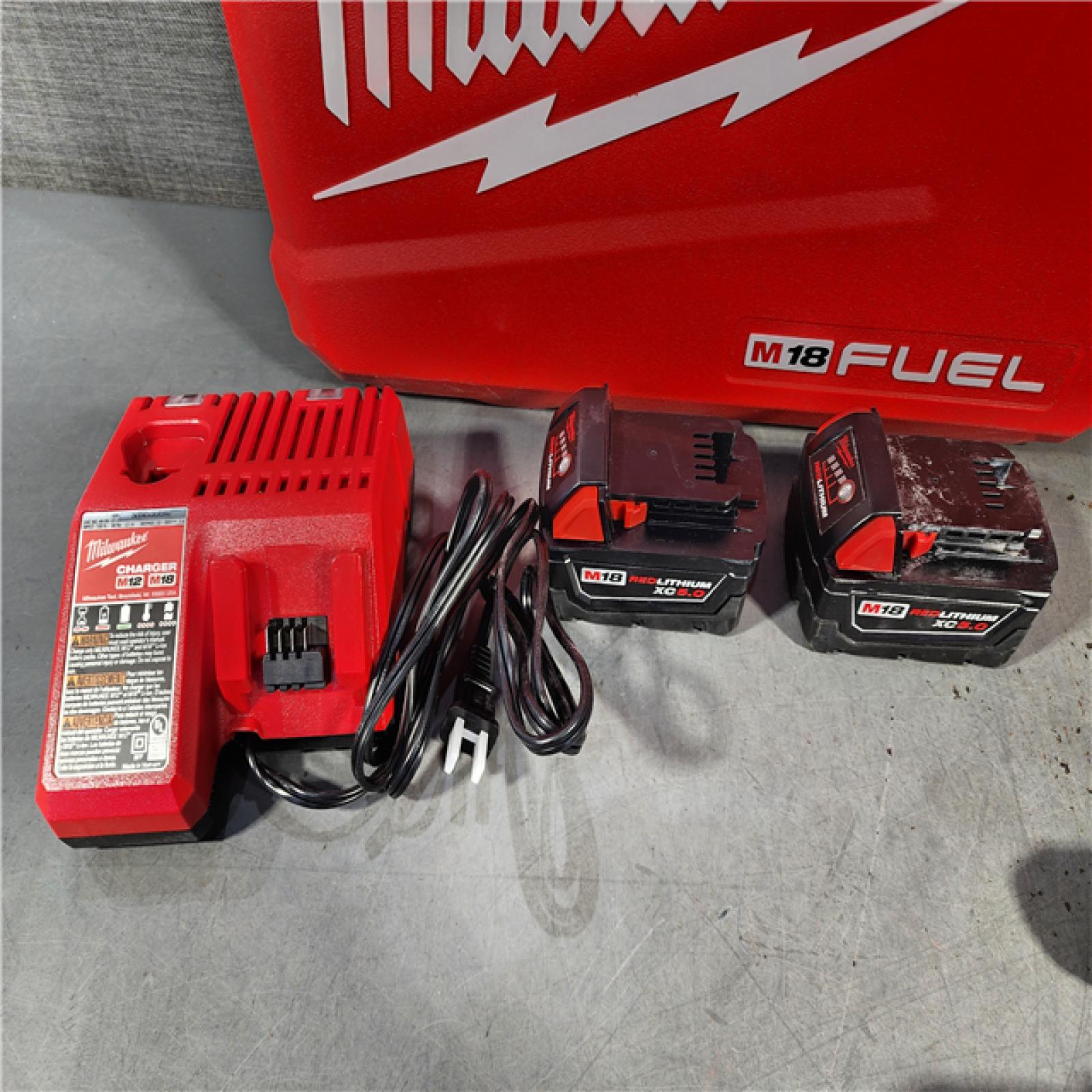 HOUSTON LOCATION - AS-IS Milwaukee M18 FUEL 18V Lithium-Ion Brushless Cordless Hammer Drill and Impact Driver Combo Kit (2-Tool) with 2 Batteries