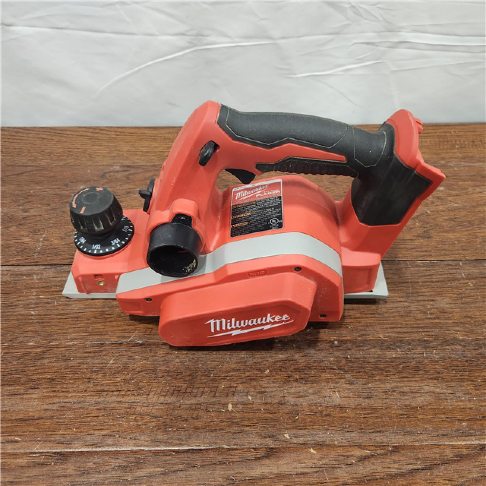 AS-IS Milwaukee M18 18-Volt Lithium-Ion Cordless 3-1/4 in. Planer (Tool-Only)