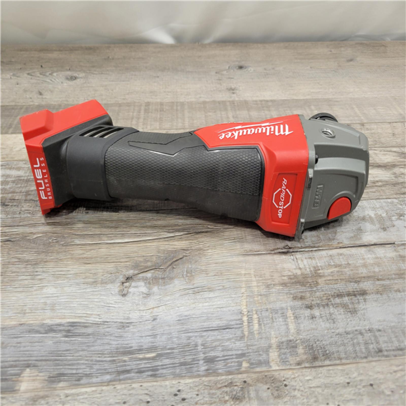 AS-IS Milwaukee M18 FUEL Brushless Cordless 4-1/2 to 5 in. Grinder (Tool Only)