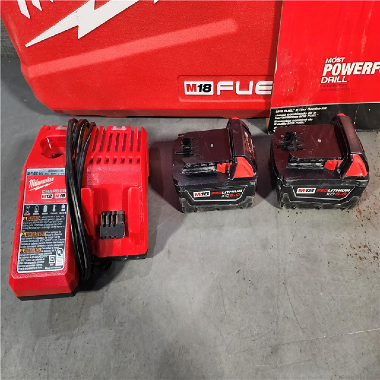 HOUSTON LOCATION - AS-IS Milwaukee M18 FUEL 18V Lithium-Ion Brushless Cordless Hammer Drill and Impact Driver Combo Kit (2-Tool) with 2 Batteries