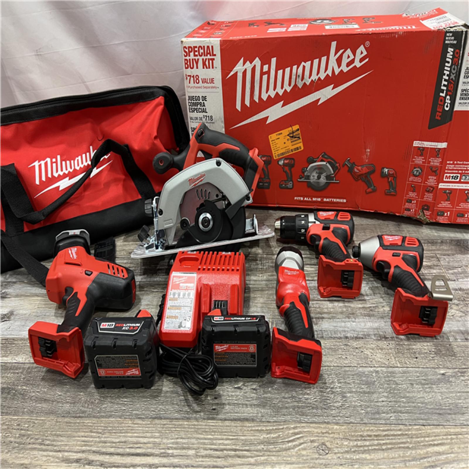 AS-IS Milwaukee M18 18-Volt Lithium-Ion Cordless Combo Tool Kit (5-Tool) with (1) 3.0Ah and (1) 1.5Ah Battery, (1) Charger, (1) Tool Bag