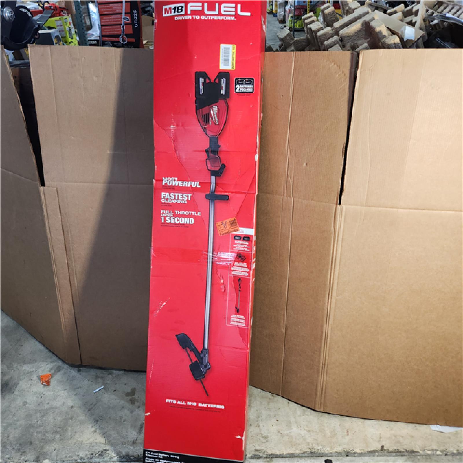 Houston location AS-IS MILWAUKEE M18 FUEL 18V Brushless Cordless 17 in. Dual Battery Straight Shaft String Trimmer with (2) 8.0 Ah Batteries and Charger