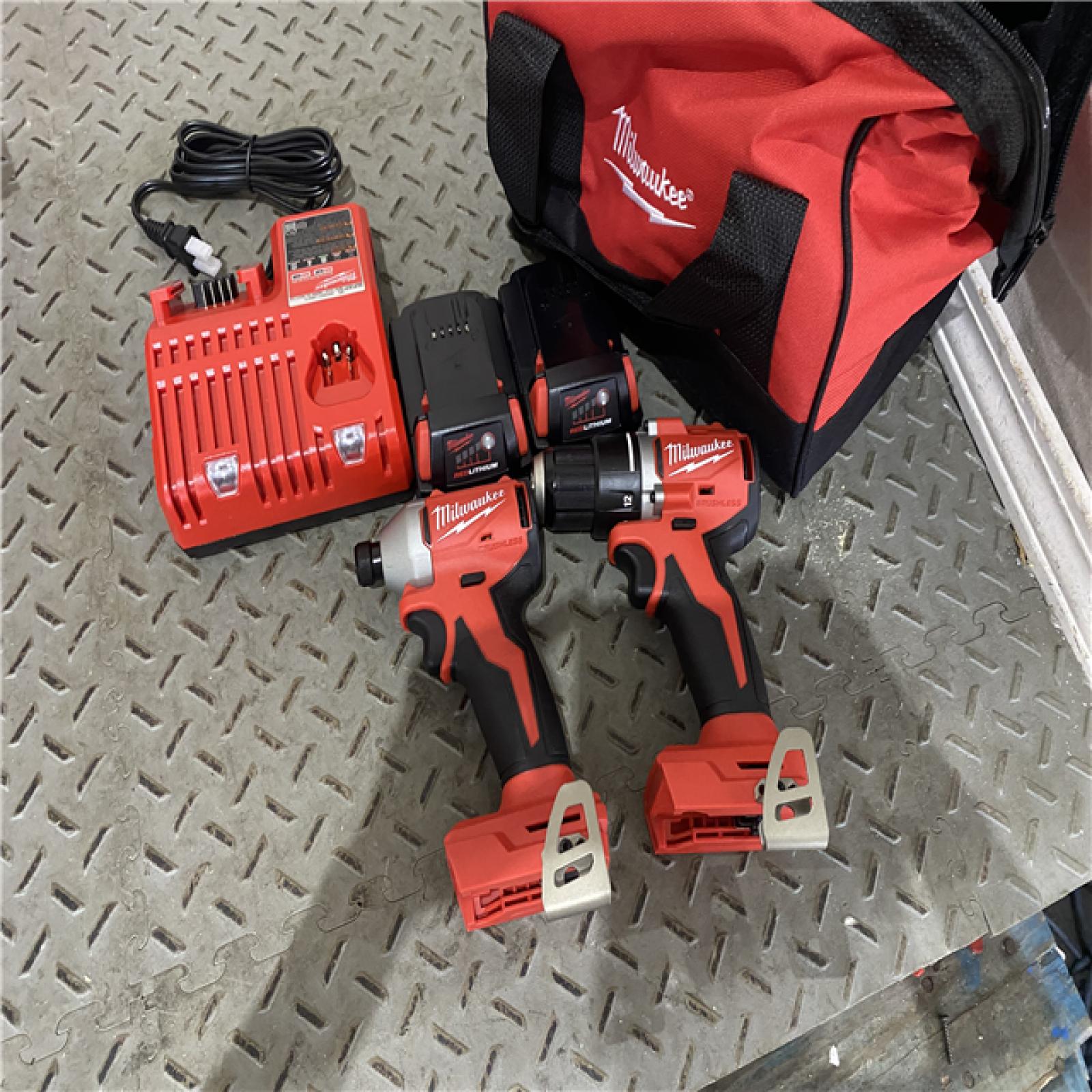 Houston location AS-IS MILWAUKEE M18 18V Lithium-Ion Brushless Cordless Compact Drill/Impact Combo Kit (2-Tool) W/(2) 2.0 Ah Batteries, Charger & Bag