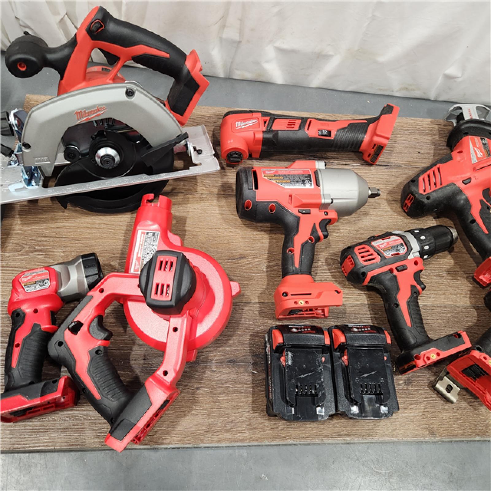 AS-IS M18 18-Volt Lithium-Ion Cordless Combo Kit 9-Tool with 2-Batteries, Charger and Tool Bag