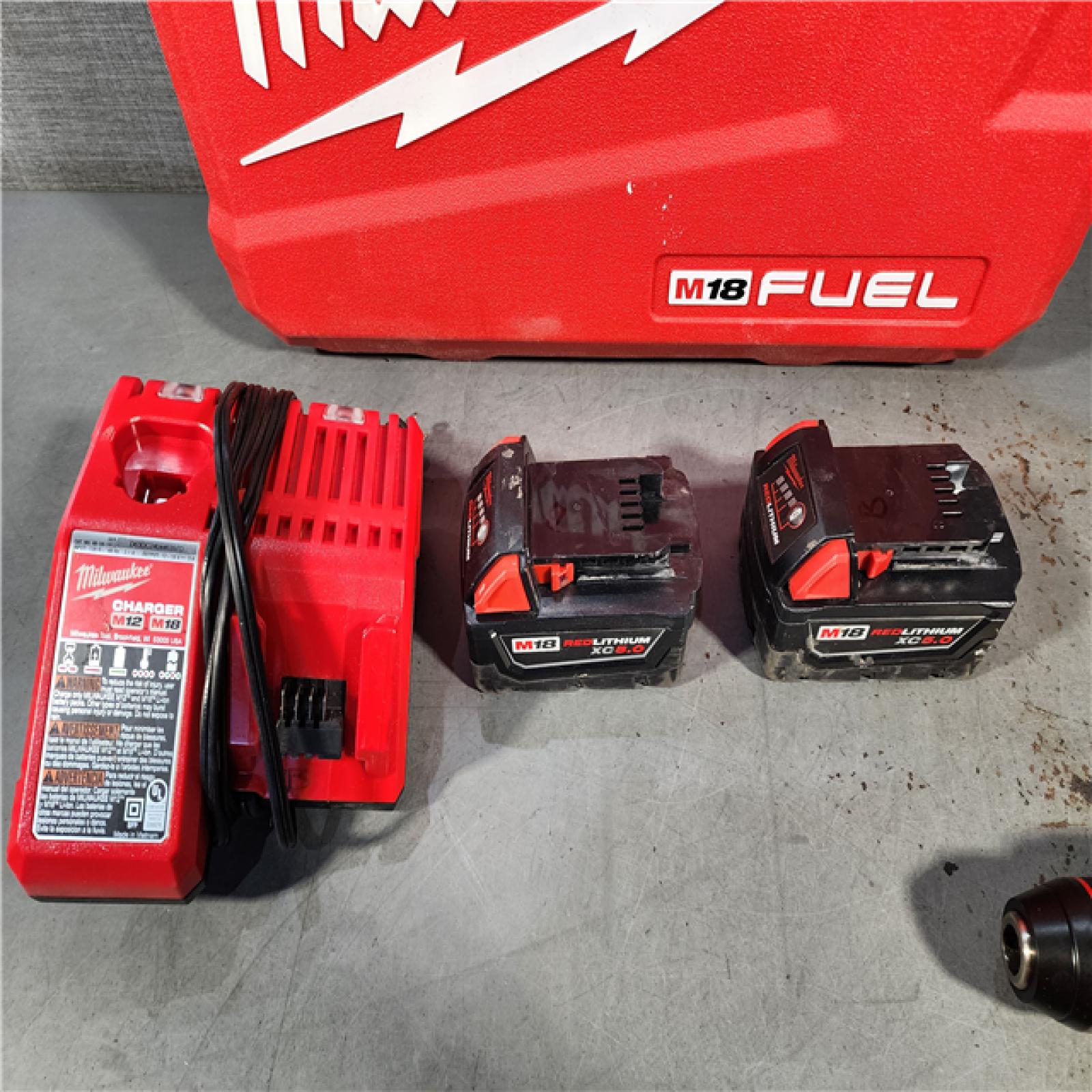 HOUSTON LOCATION - AS-IS Milwaukee M18 FUEL 18V Lithium-Ion Brushless Cordless Hammer Drill and Impact Driver Combo Kit (2-Tool) with 2 Batteries