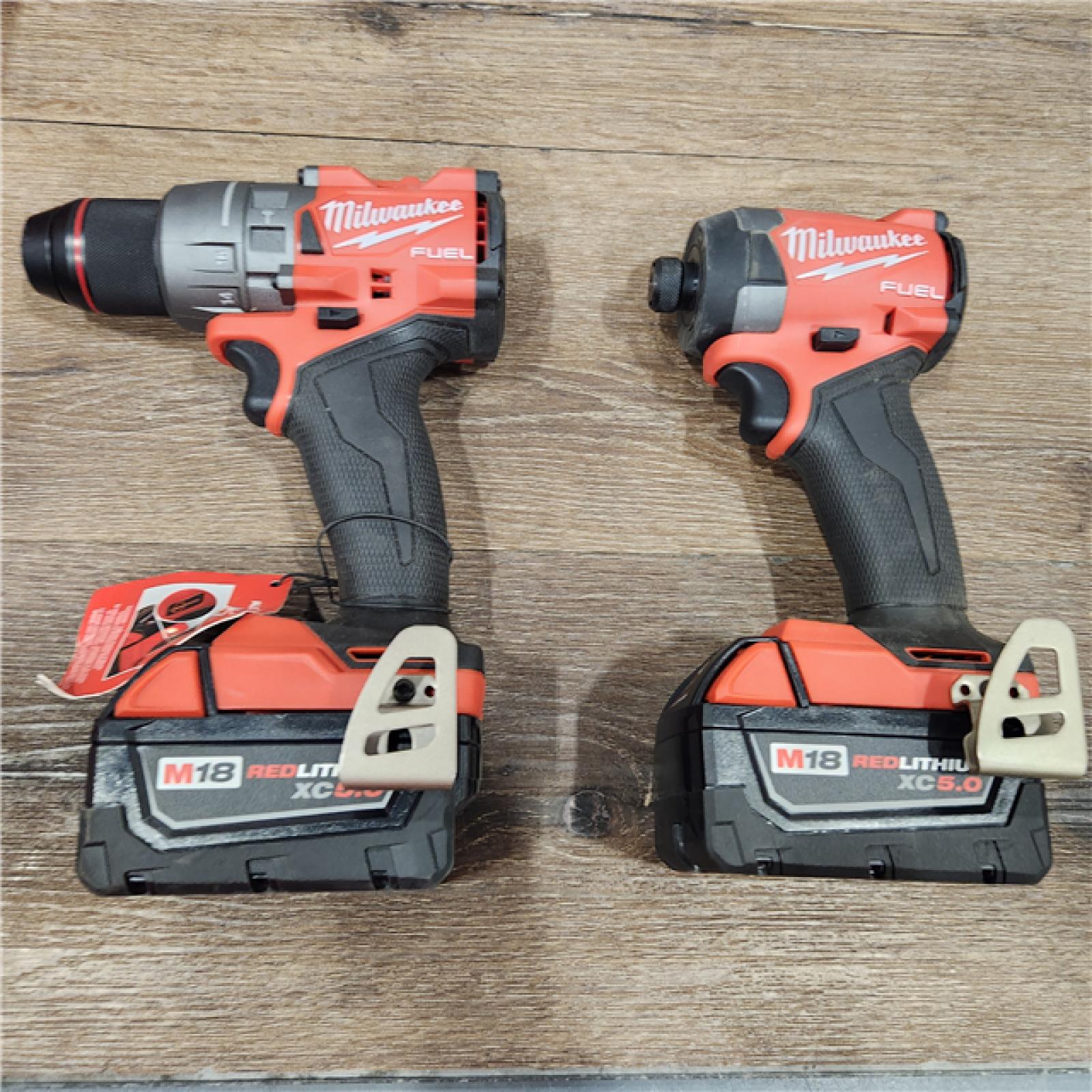 AS-IS Milwaukee M18 FUEL 18V Lithium-Ion Brushless Cordless Hammer Drill and Impact Driver Combo Kit (2-Tool) with 2 Batteries