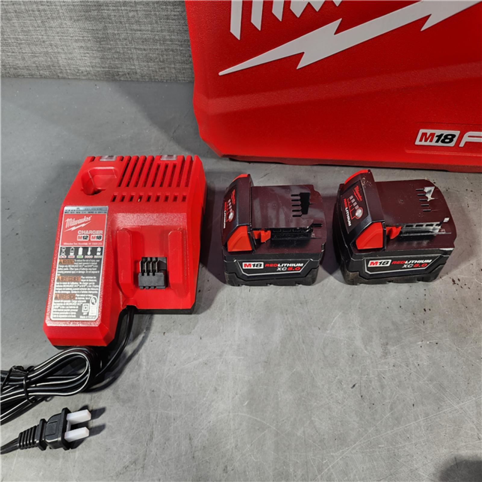 HOUSTON LOCATION - AS-IS Milwaukee M18 FUEL 18V Lithium-Ion Brushless Cordless Hammer Drill and Impact Driver Combo Kit (2-Tool) with 2 Batteries