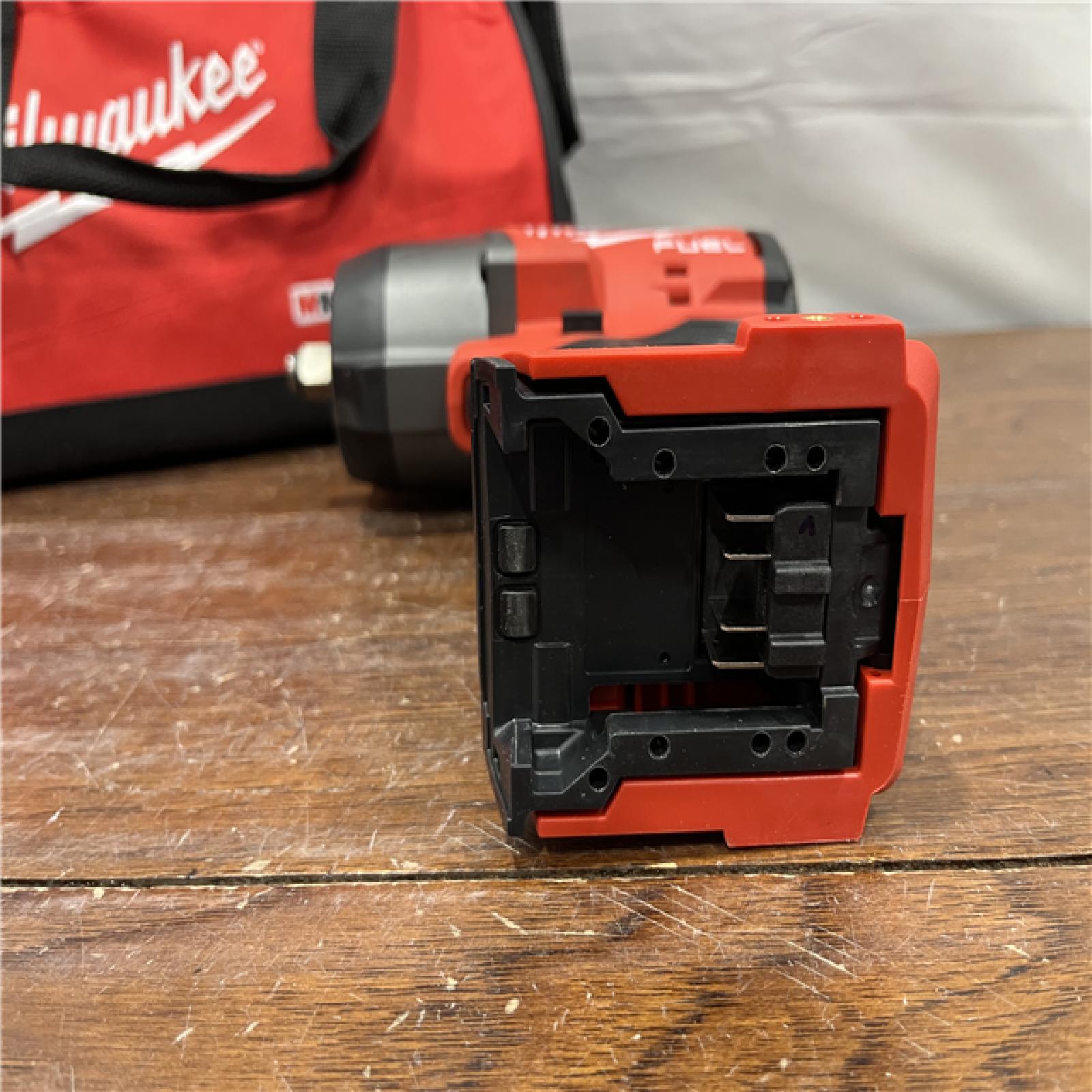 AS-ISMilwaukee M18 1/2 in. Cordless Brushless High Torque Impact Wrench Kit (Battery & Charger)