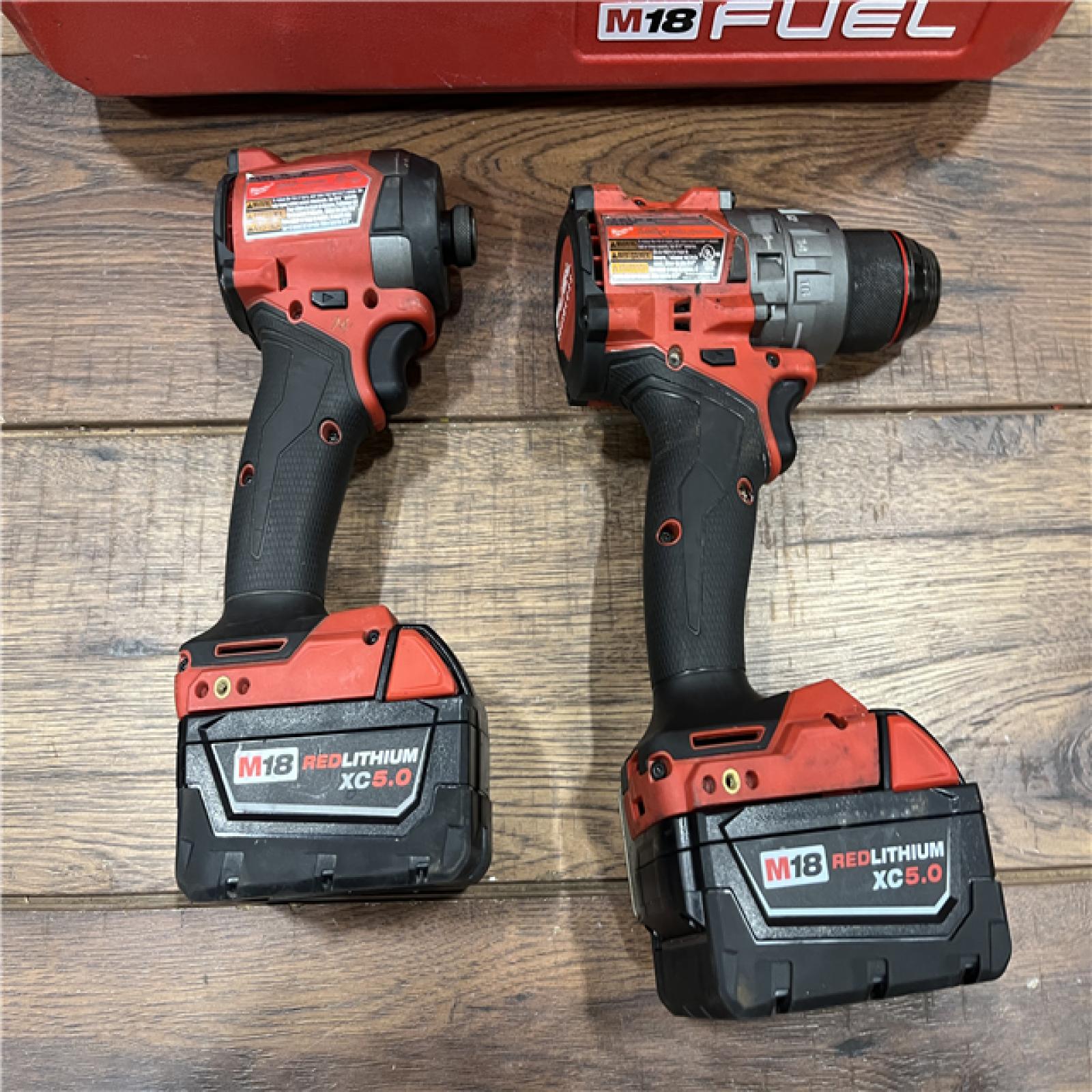 AS-IS Milwaukee M18 FUEL 18V Lithium-Ion Brushless Cordless Hammer Drill and Impact Driver Combo Kit (2-Tool) with 2 Batteries