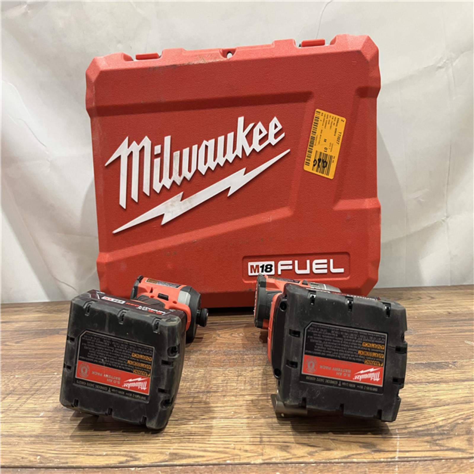 AS-IS Milwaukee M18 FUEL 18V Lithium-Ion Brushless Cordless Hammer Drill and Impact Driver Combo Kit (2-Tool) with 2 Batteries