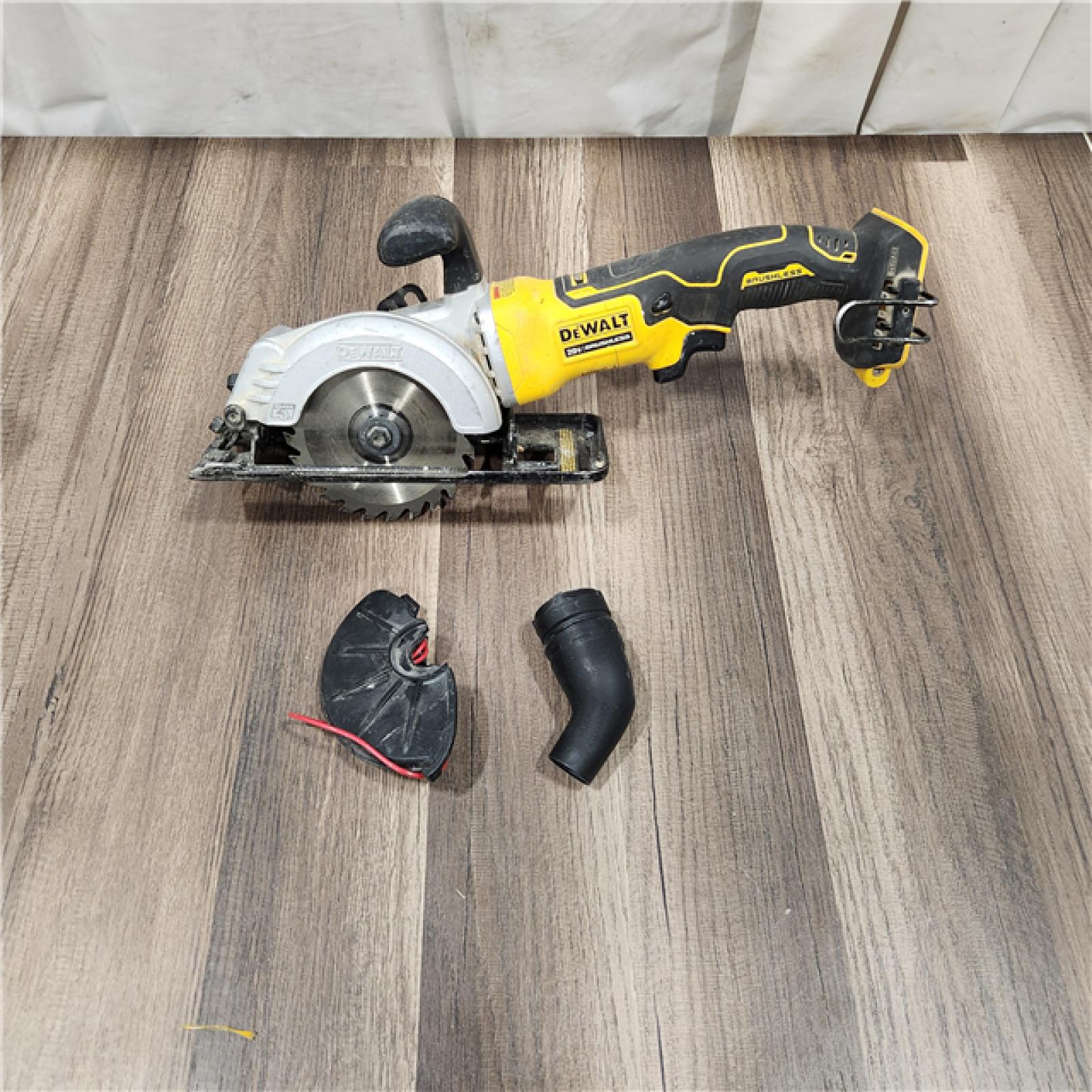 AS IS DEWALT ATOMIC 20V MAX Cordless Brushless 4-1/2 in. Circular Saw (Tool Only)