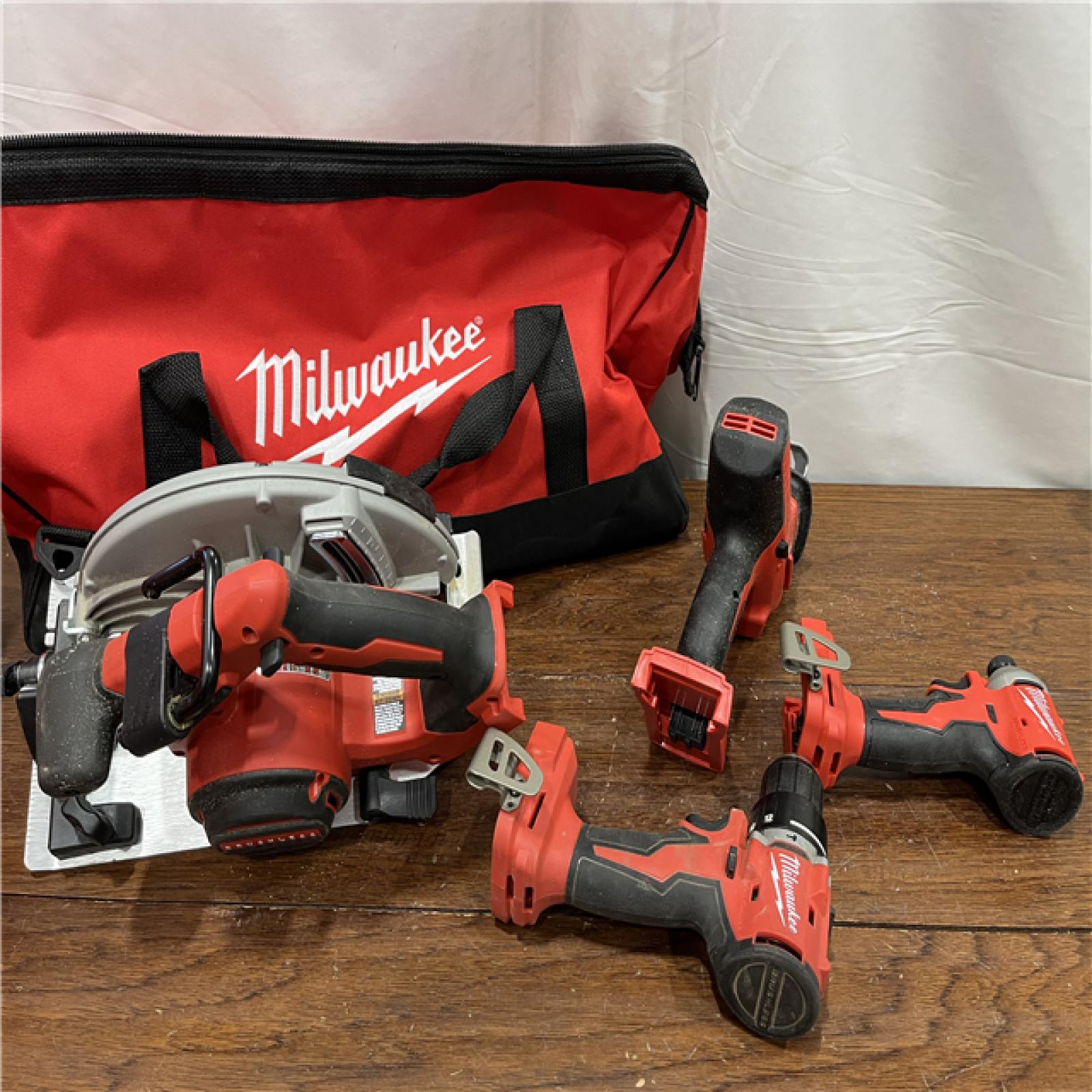 AS-ISMilwaukee M18 18-Volt Lithium-Ion Brushless Cordless Combo Kit (4-Tool) with 2-Batteries, 1-Charger and Tool Bag